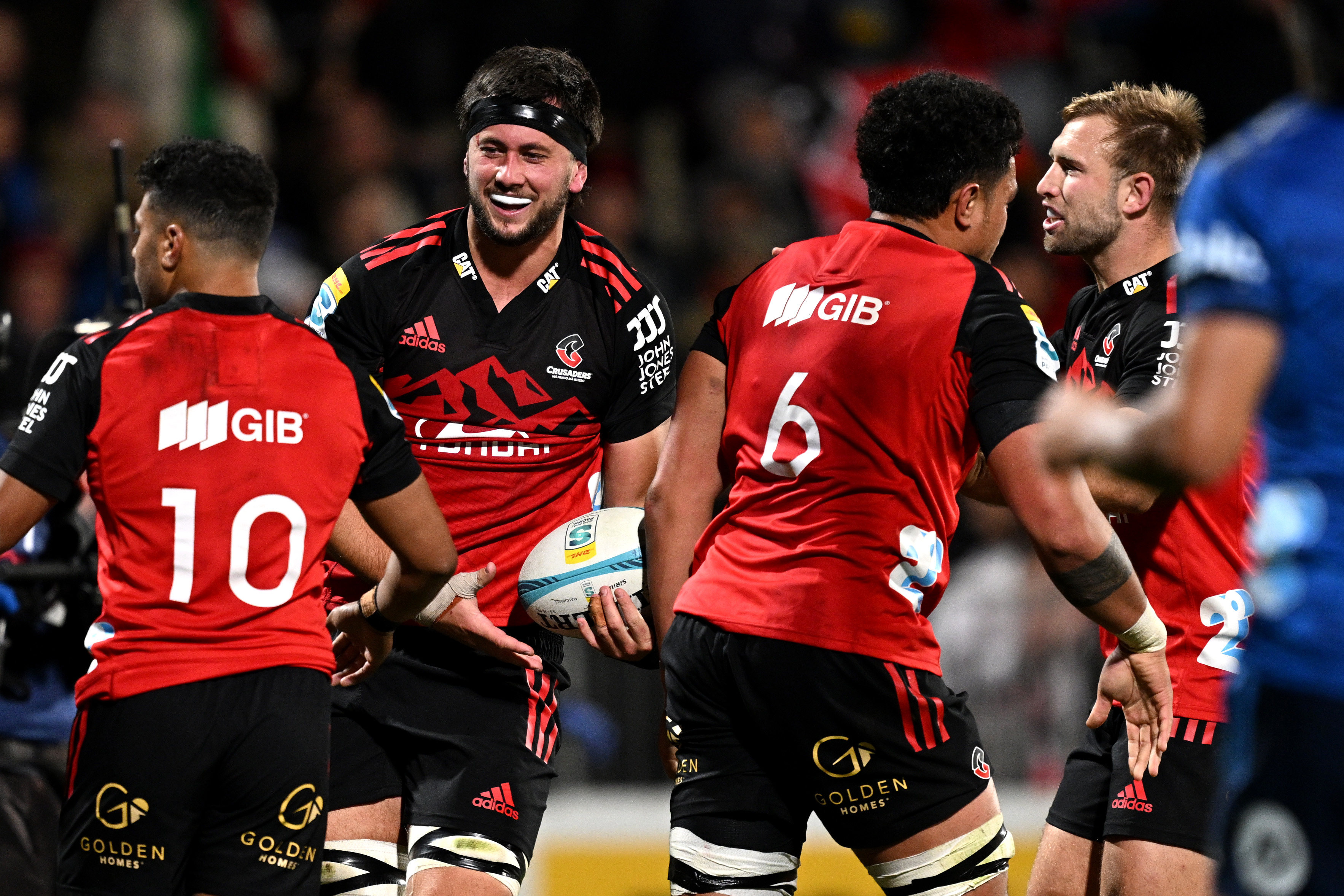 CHRISTCHURCH, NEW ZEALAND - MAY 13: Quinten Strange of the Crusaders celebrates after scoring a try during the round 12 Super Rugby Pacific match between Crusaders and Blues at Orangetheory Stadium, on May 13, 2023, in Christchurch, New Zealand. (Photo by Joe Allison/Getty Images)