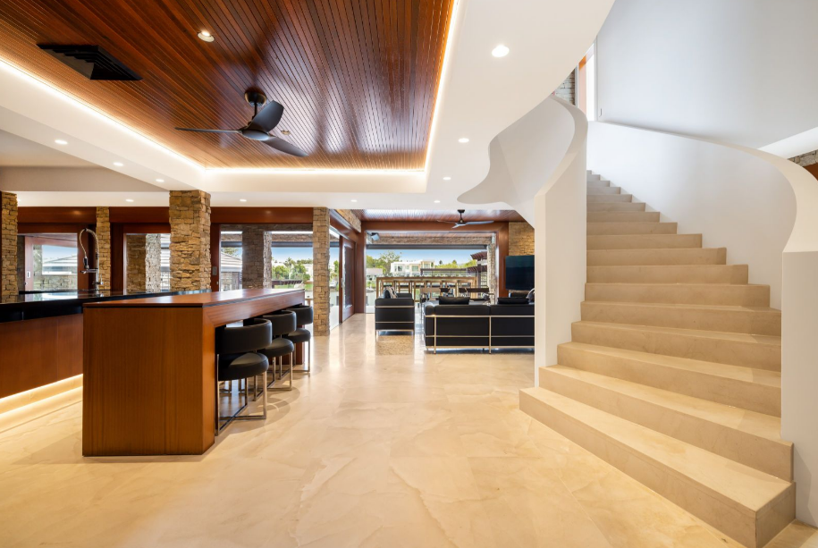 Property for sale in Benowa Waters, Queensland, with fossil-infused limestone flooring.