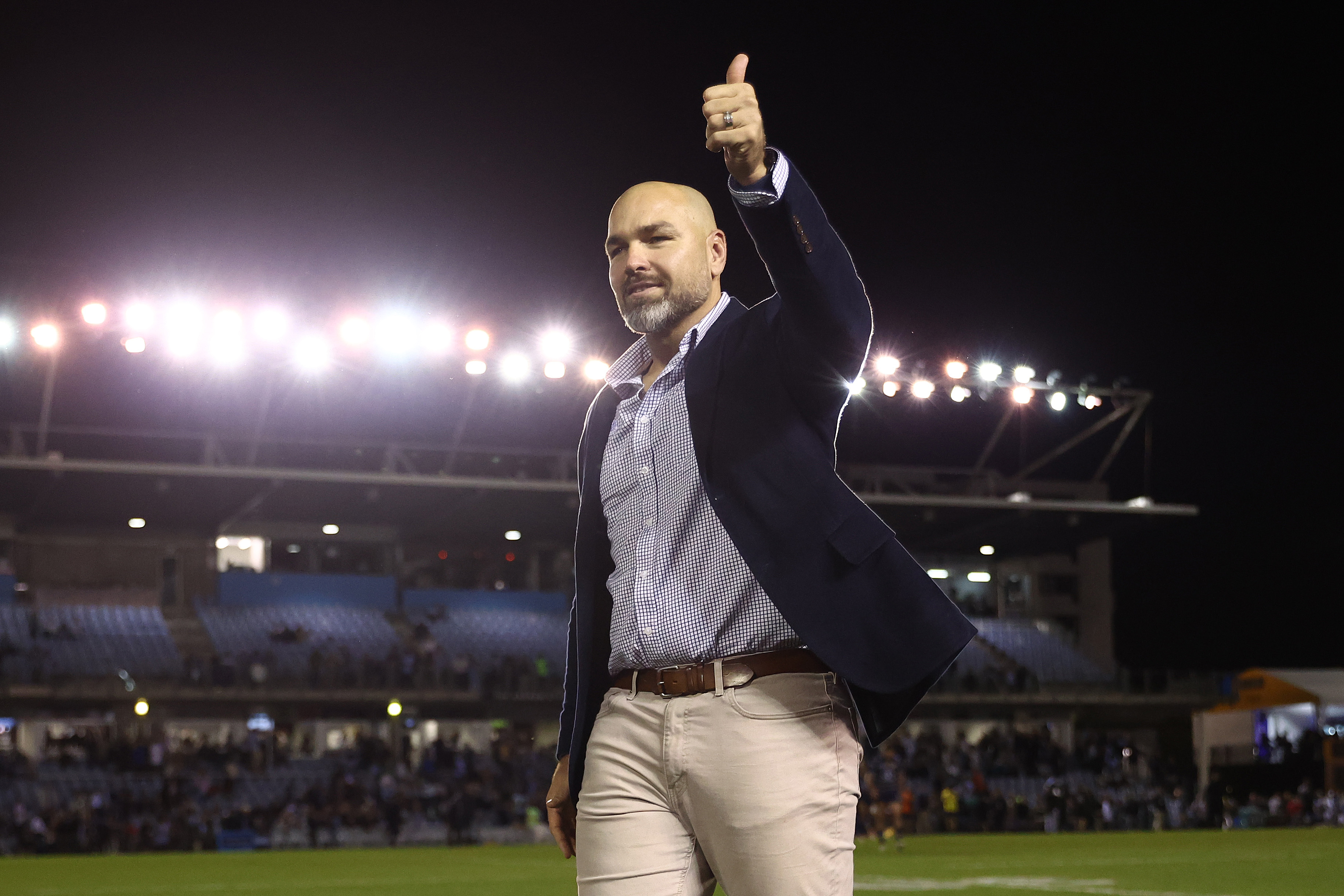 Cowboys coach Todd Payten thanks the crowd after winning the NRL Qualifying Final match between the Cronulla Sharks and the North Queensland Cowboys at PointsBet Stadium on September 10, 2022 in Sydney, Australia. (Photo by Mark Metcalfe/Getty Images)