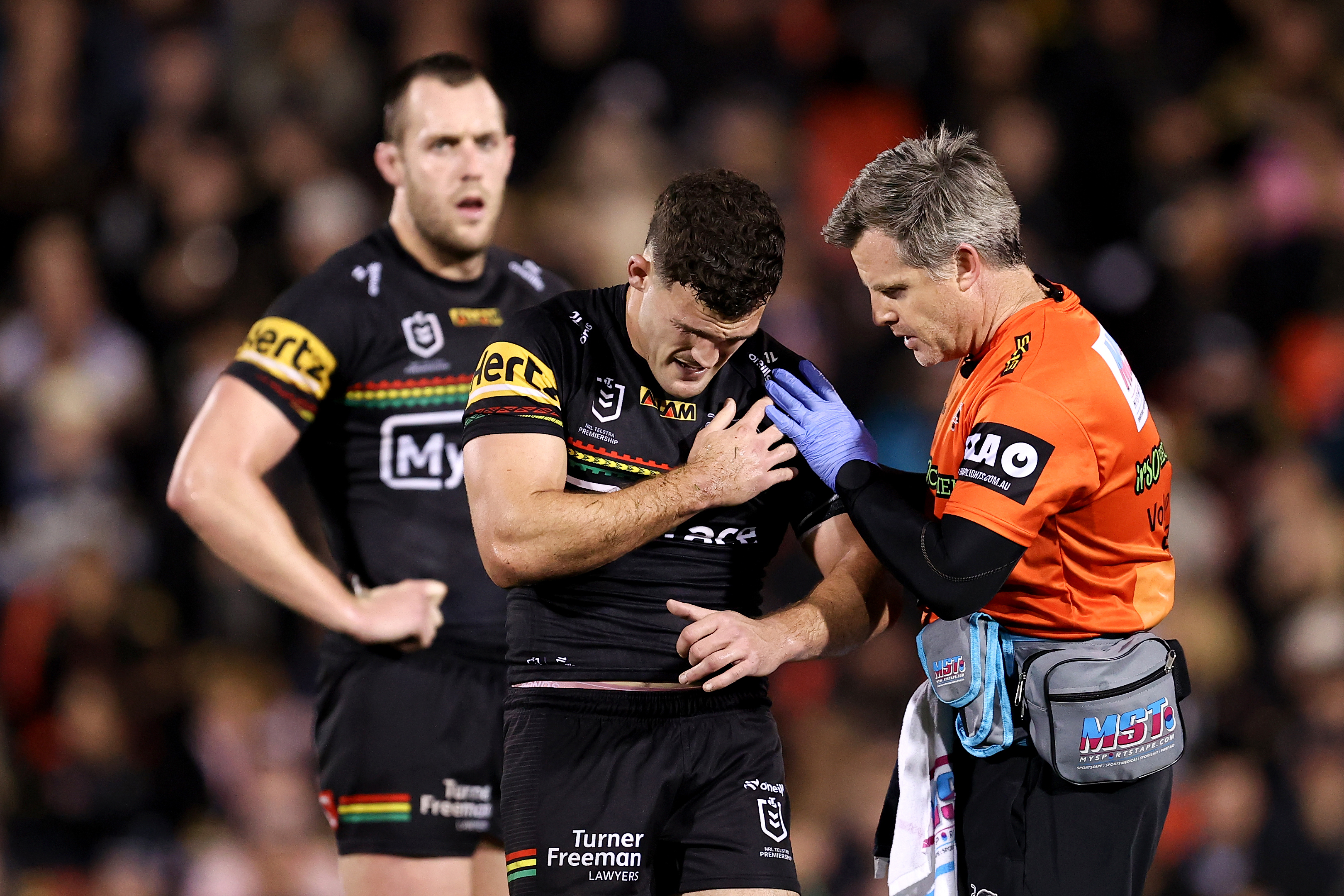 Nathan Cleary of the Panthers holds his shoulder during the round 24 NRL match between Penrith Panthers and Melbourne Storm at BlueBet Stadium, on August 15, 2024, in Penrith, Australia. (Photo by Brendon Thorne/Getty Images)