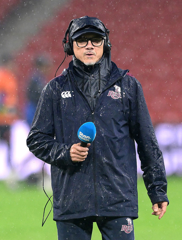 Coach Les Kiss of the Reds is seen during the warm up.