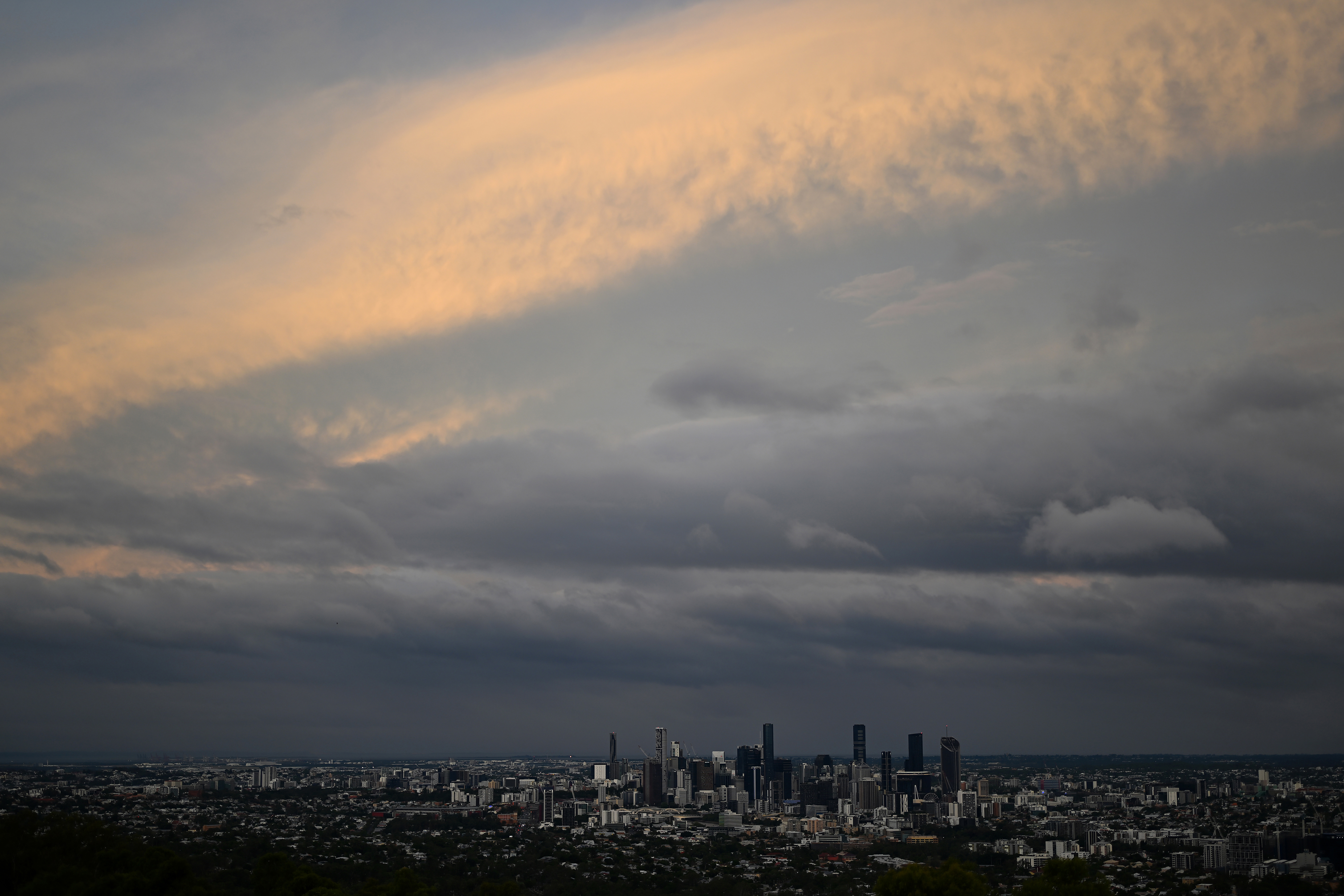 A general view is seen of Brisbane from the Mount Coot-tha Summit Lookout on March 05, 2025 in Brisbane, Australia. Tropical Cyclone Alfred is expected to make landfall in southeast Queensland and northern NSW as a Category 2 storm, marking the first time a cyclone has directly hit the region in over 50 years. The storm is forecast to bring damaging winds, heavy rainfall, and potential storm surges.