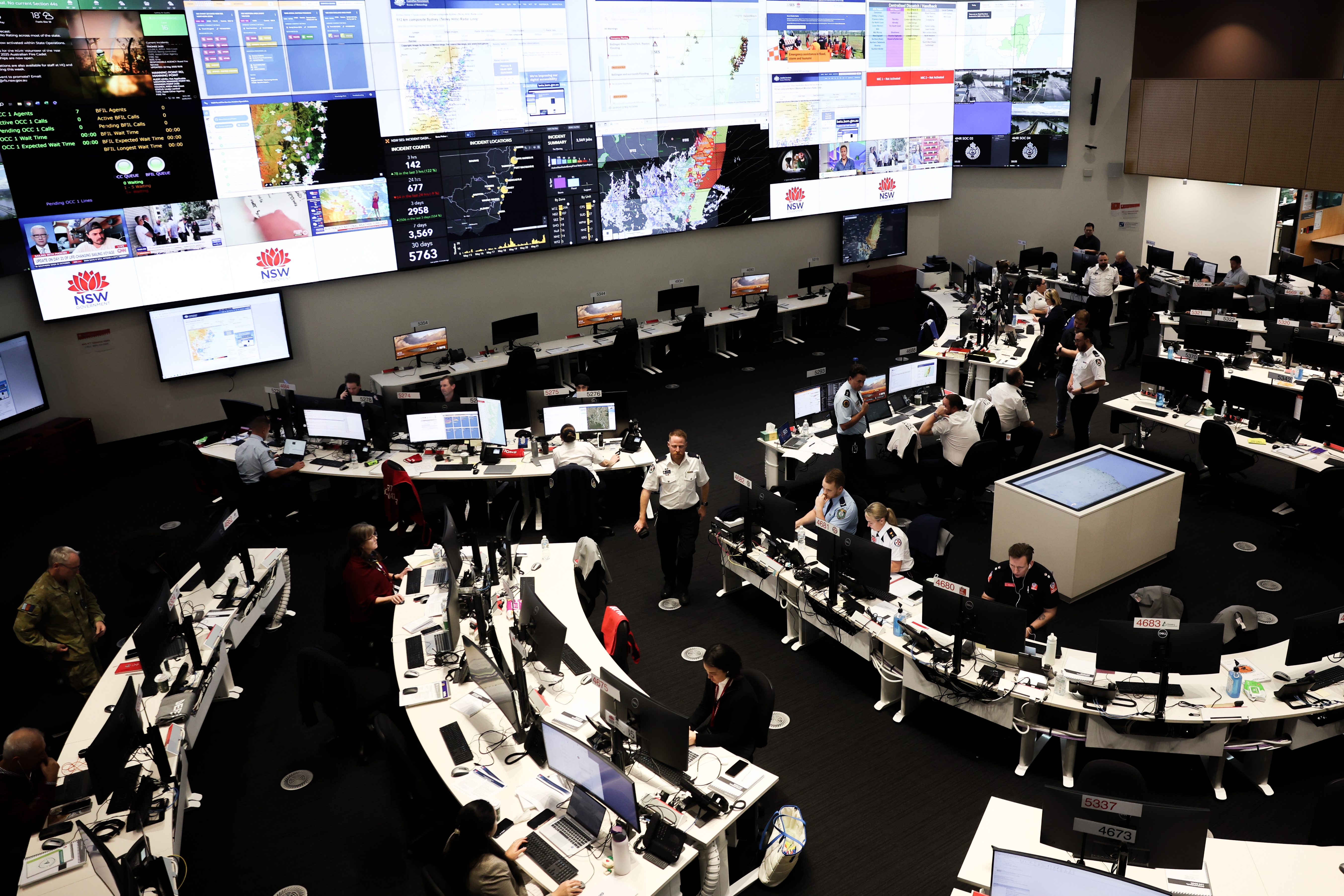 SES incident managers and staff are seen in the control room as impacts of flooding in the Hunter and Mid North Coast are discussed at New South Wales State Emergency Services headquarters in Homebush, Sydney, Thursday, 22 May 2025.   More than 500 people have been rescued from floodwaters since the major emergency started in the Mid North Coast and Hunter regions with the NSW SES having  responded to more than 4100 incidents.  