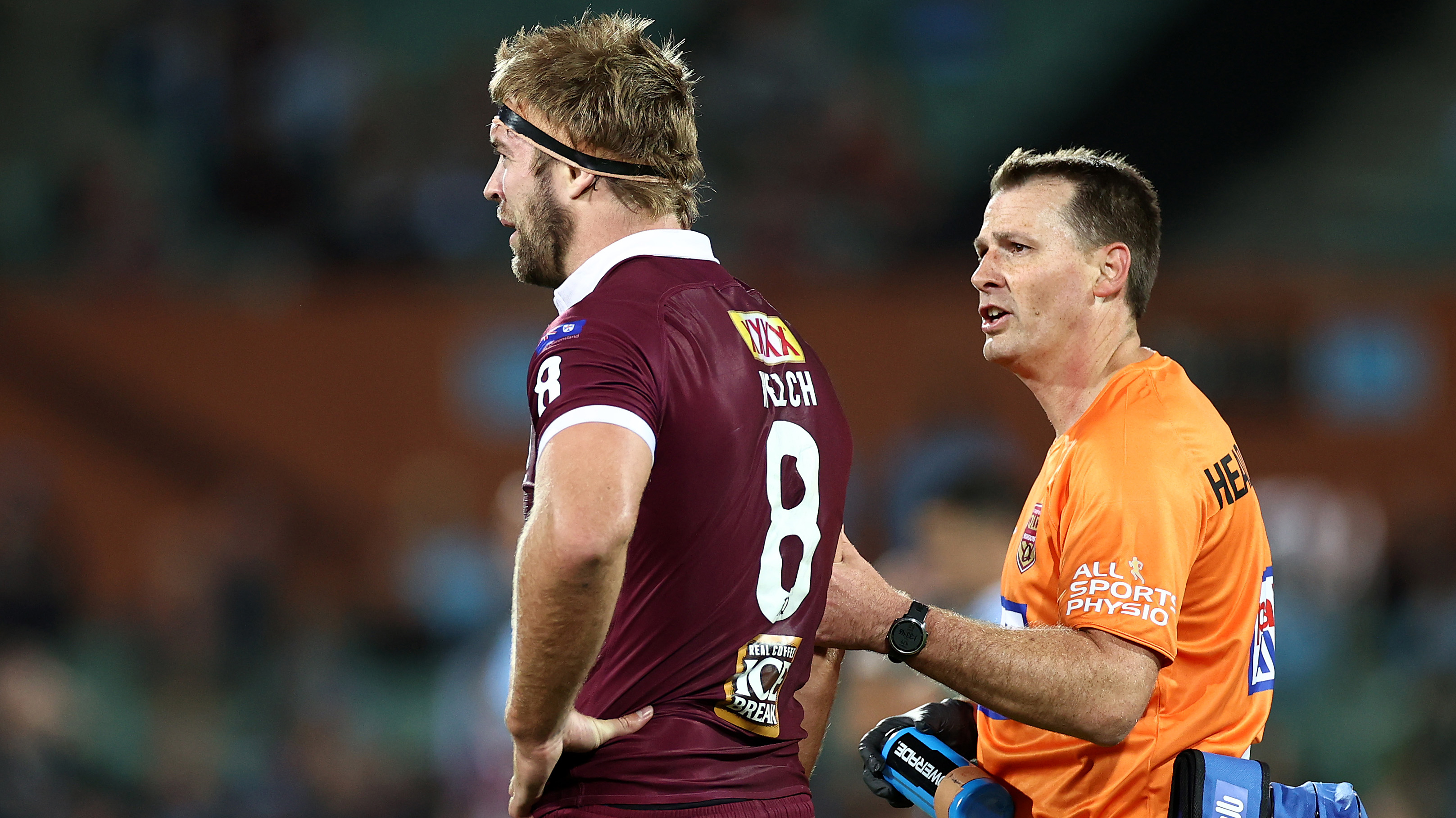 Christian Welch is assisted by a Queensland trainer in Origin I.