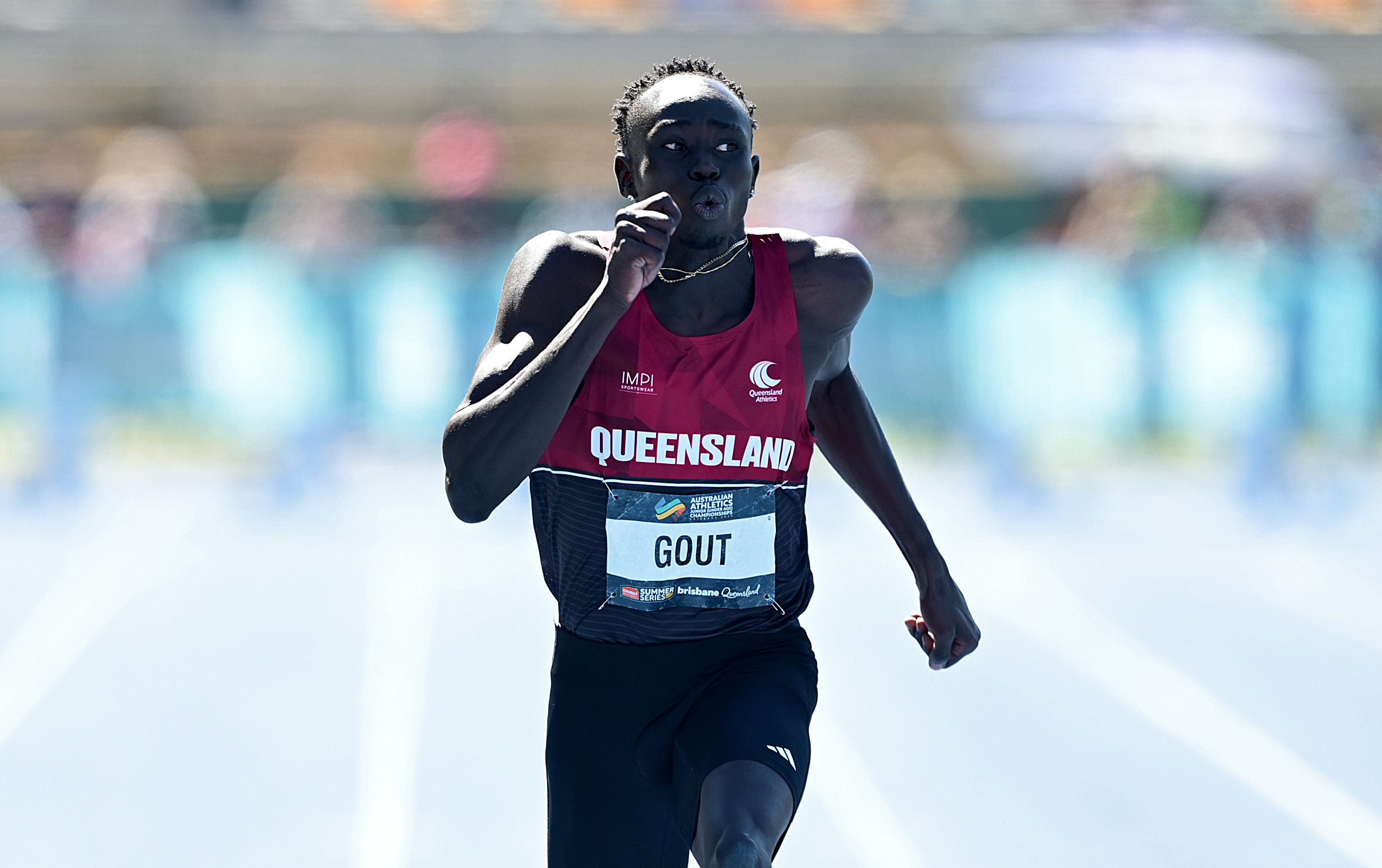 BRISBANE, AUSTRALIA - APRIL 18: Gout Gout competes in the semi final of the Men's U20's 100m event during the 2026 Australian Athletics Junior Championships at Queensland Sport and Athletics Centre on April 18, 2026 in Brisbane, Australia. (Photo by Bradley Kanaris/Getty Images)