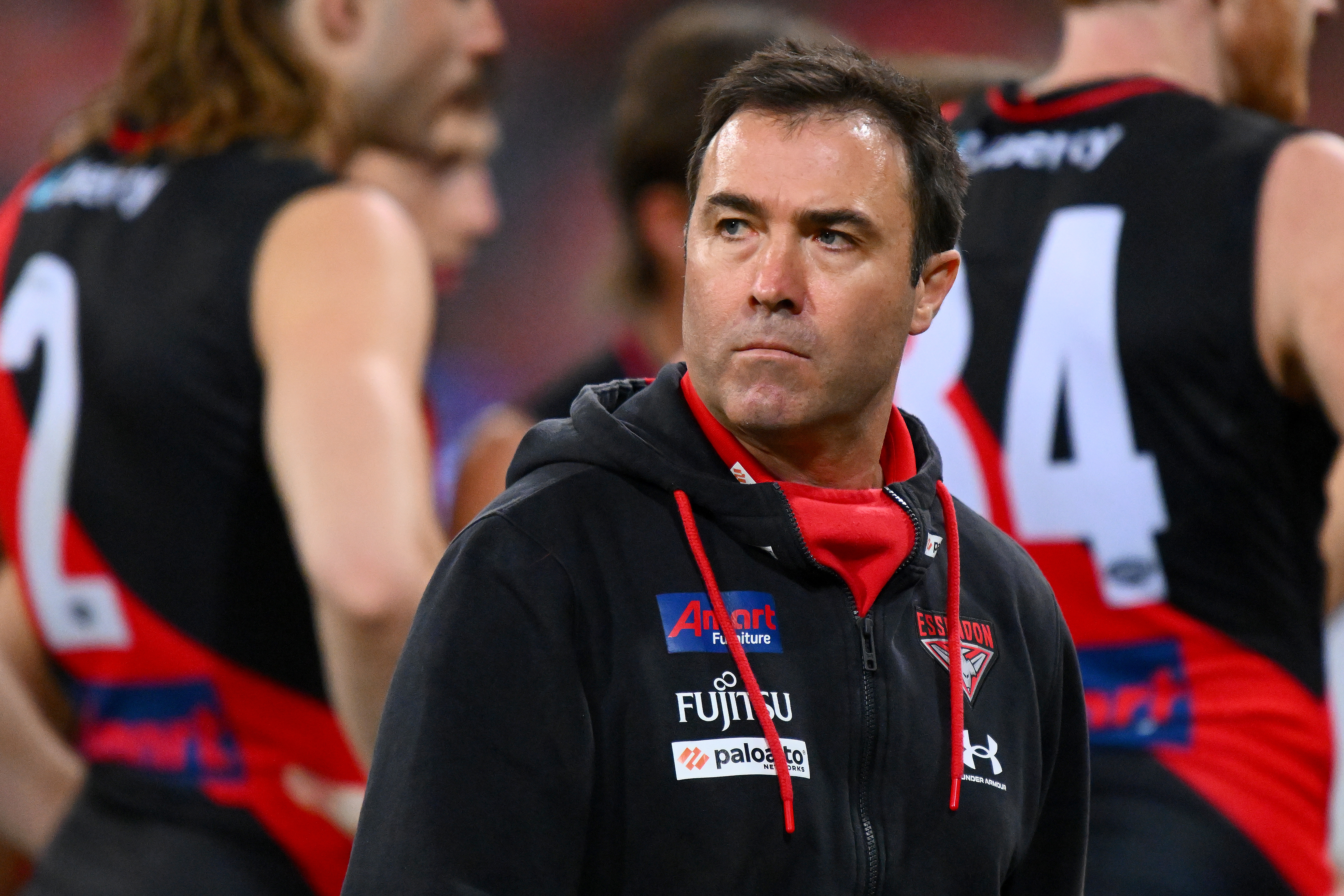 SYDNEY, AUSTRALIA - AUGUST 19: Bombers head coach, Brad Scott reacts during the 2023 AFL Round 23 match between the GWS GIANTS and the Essendon Bombers at GIANTS Stadium on August 19, 2023 in Sydney, Australia. (Photo by Morgan Hancock/AFL Photos via Getty Images)