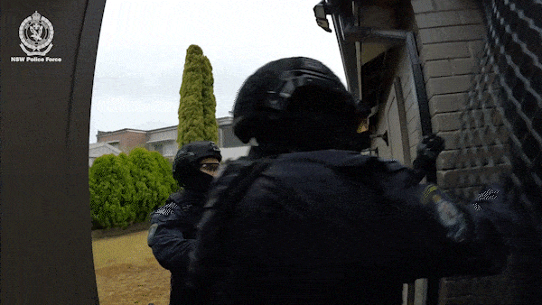 Comancheros member charged after Raptor Squad raid Sydney homes