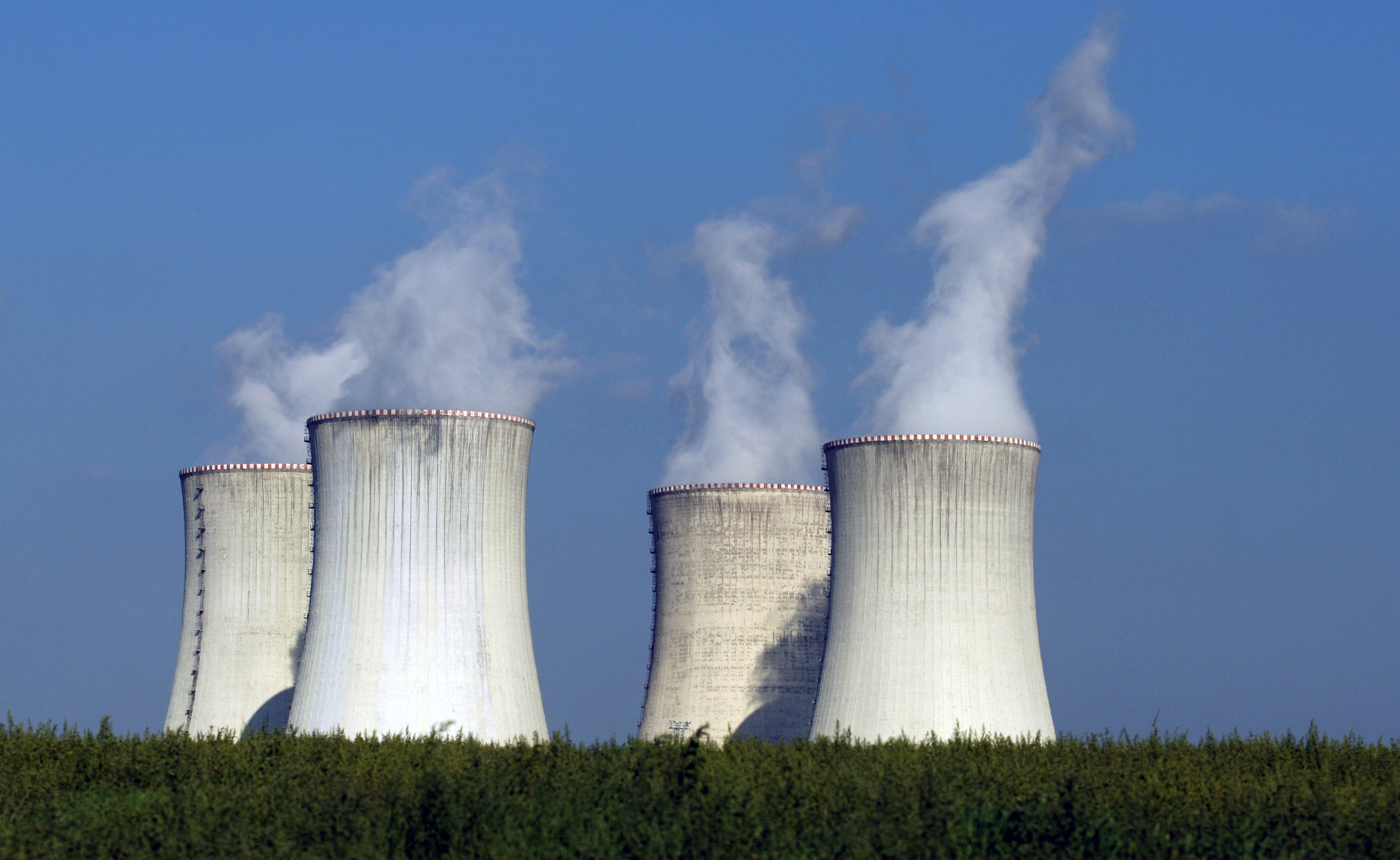 Four of the cooling towers of the Dukovany nuclear power plant