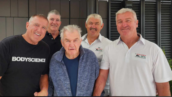 George Piggins (centre) is in hospital with dementia. This picture was taken when four of his former Rabbitohs players (L-R) Darren Brown, Les Davidson, Michael Andrews and Darryl Neville came to visit him in hospital.