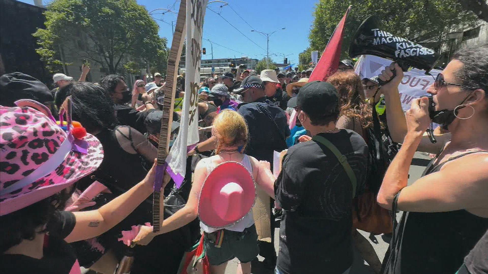 Victoria Police said they were "confronted" by "up to 50" protesters soon after the march started.﻿