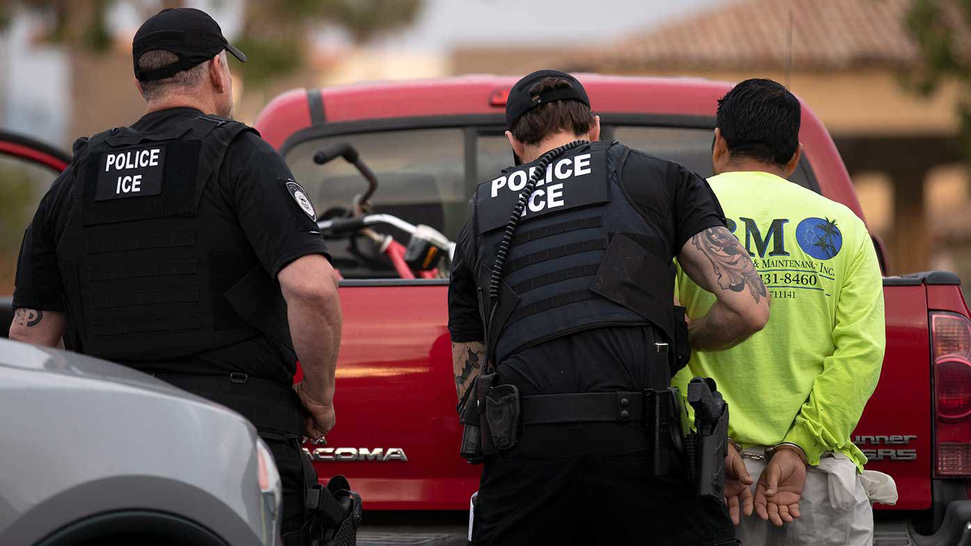 ICE officers arrest a man during a crackdown during the first Trump administration.