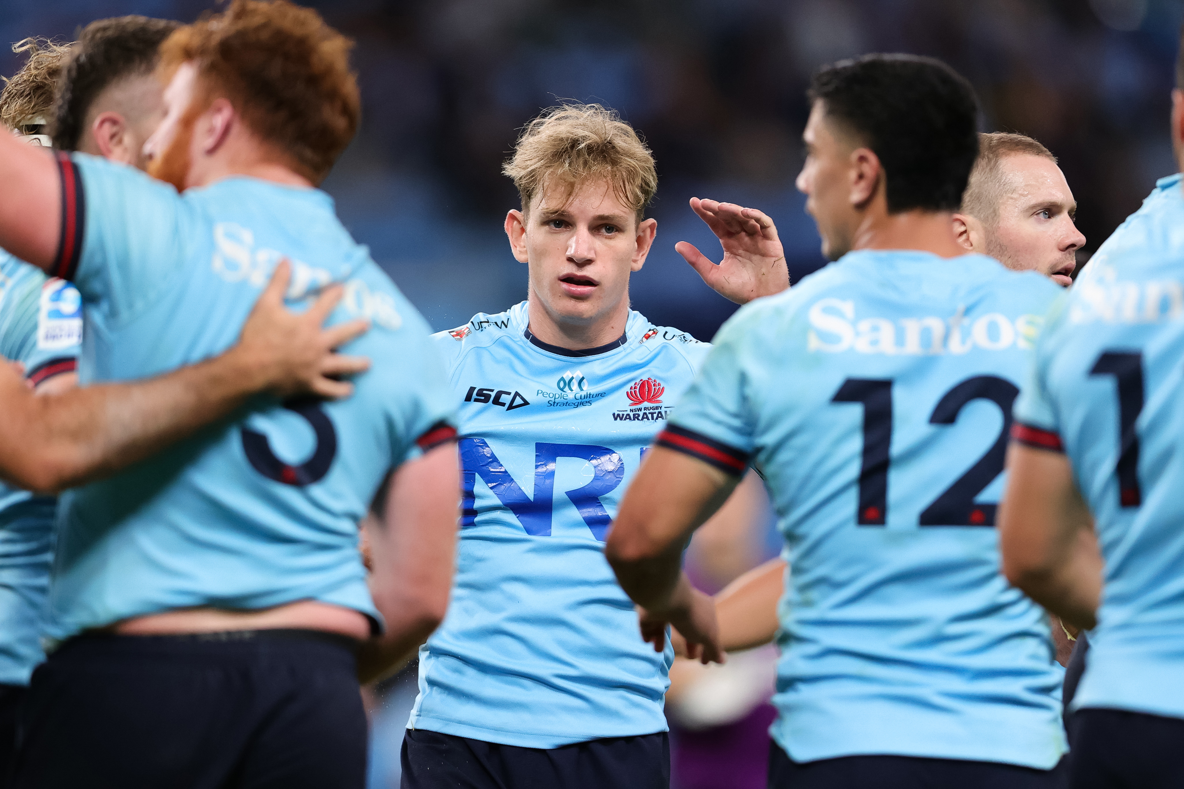Max Jorgensen of the Waratahs looks on.
