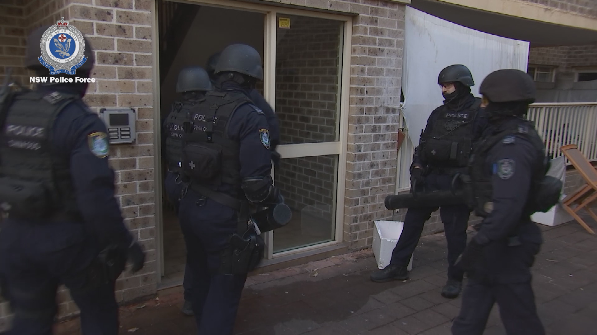 More than $660k cash, drugs, guns seized in police raids of Sydney's south-west