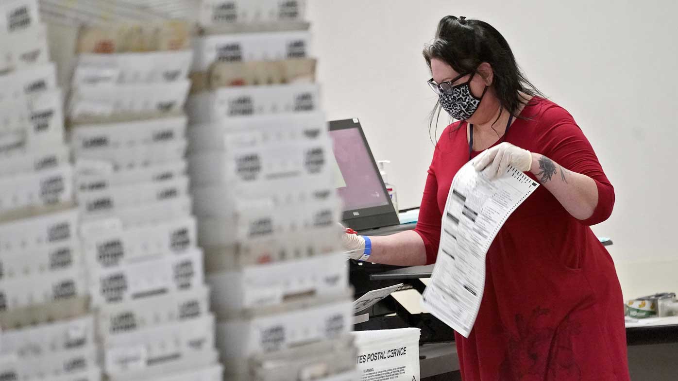 Arizona elections officials continue to count ballots inside the Maricopa County Recorder's Office.