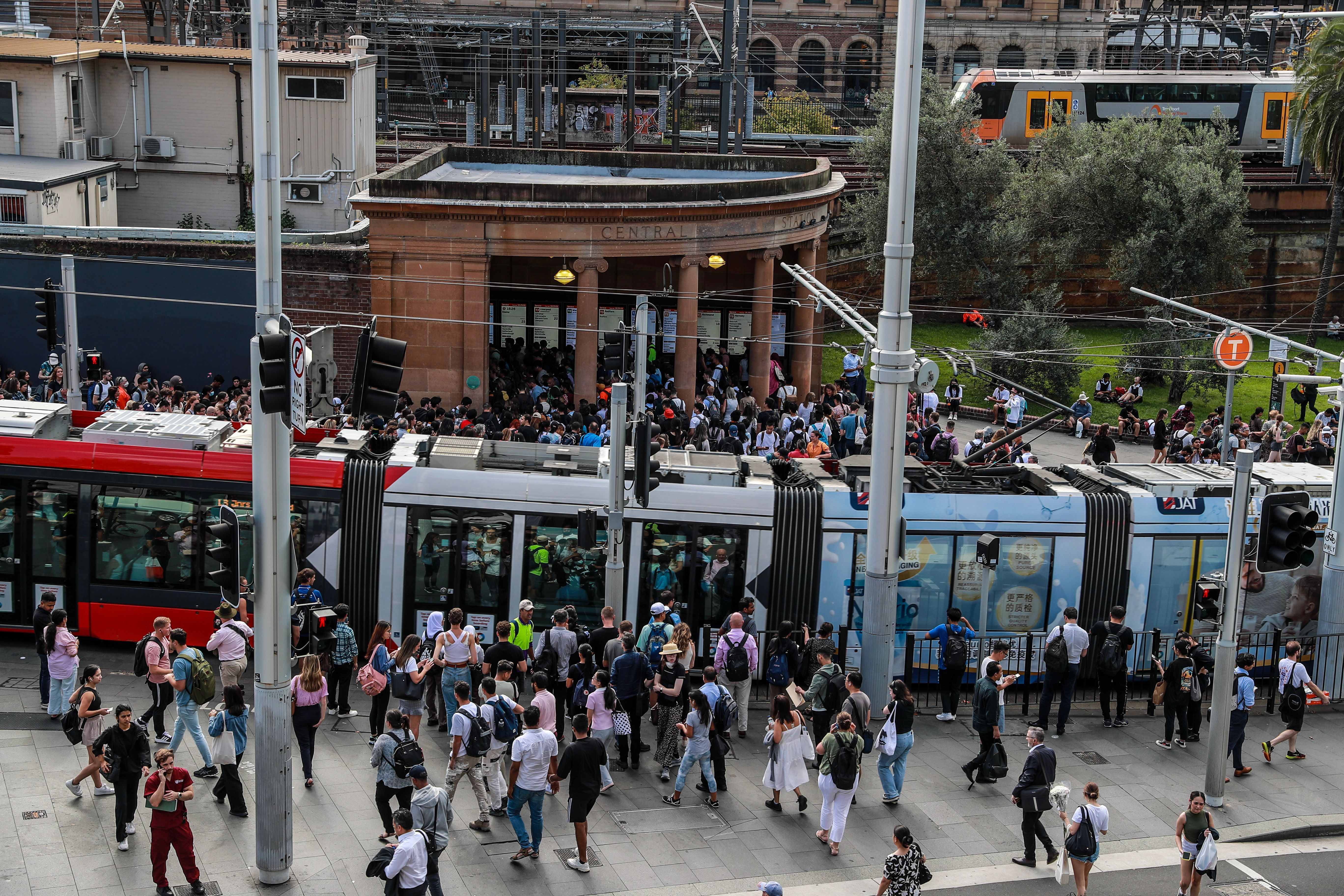 Commuters wait outside Central Station on March 08, 2023 in Sydney, Australia.