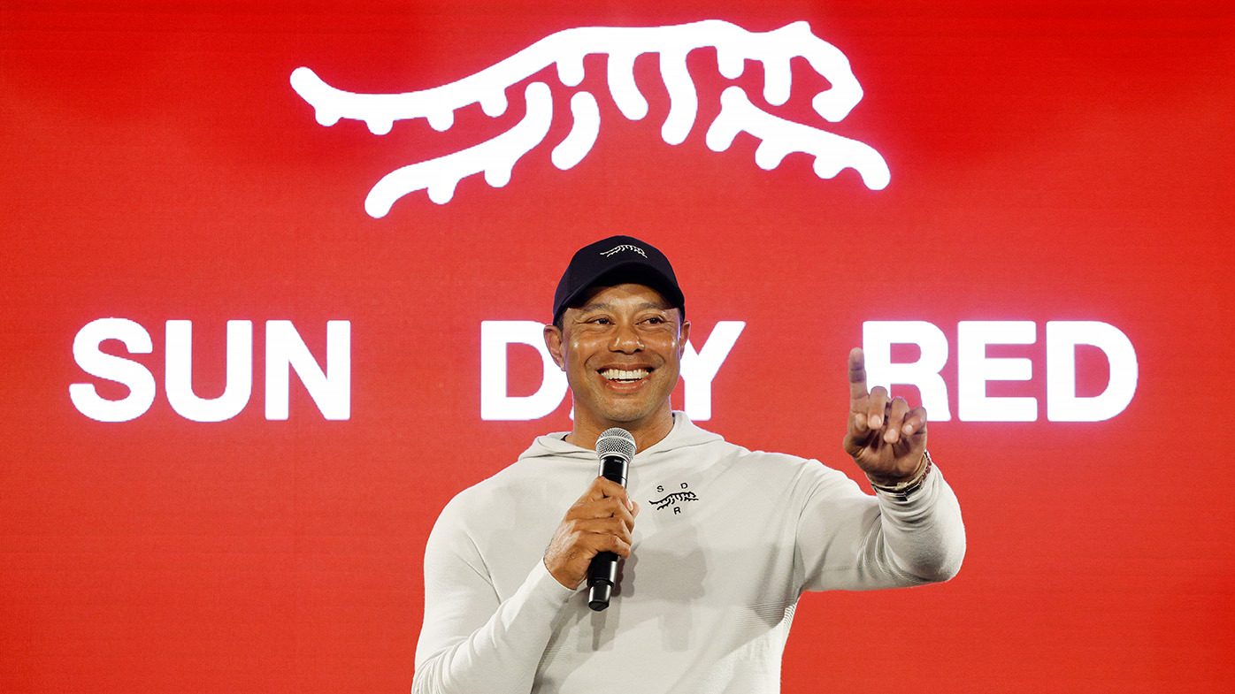 Tiger Woods speaks during the launch of Tiger Woods and TaylorMade Golf's new apparel and footwear brand "Sun Day Red" at Palisades Village on February 12, 2024 in Pacific Palisades, California. (Photo by Kevork Djansezian/Getty Images)