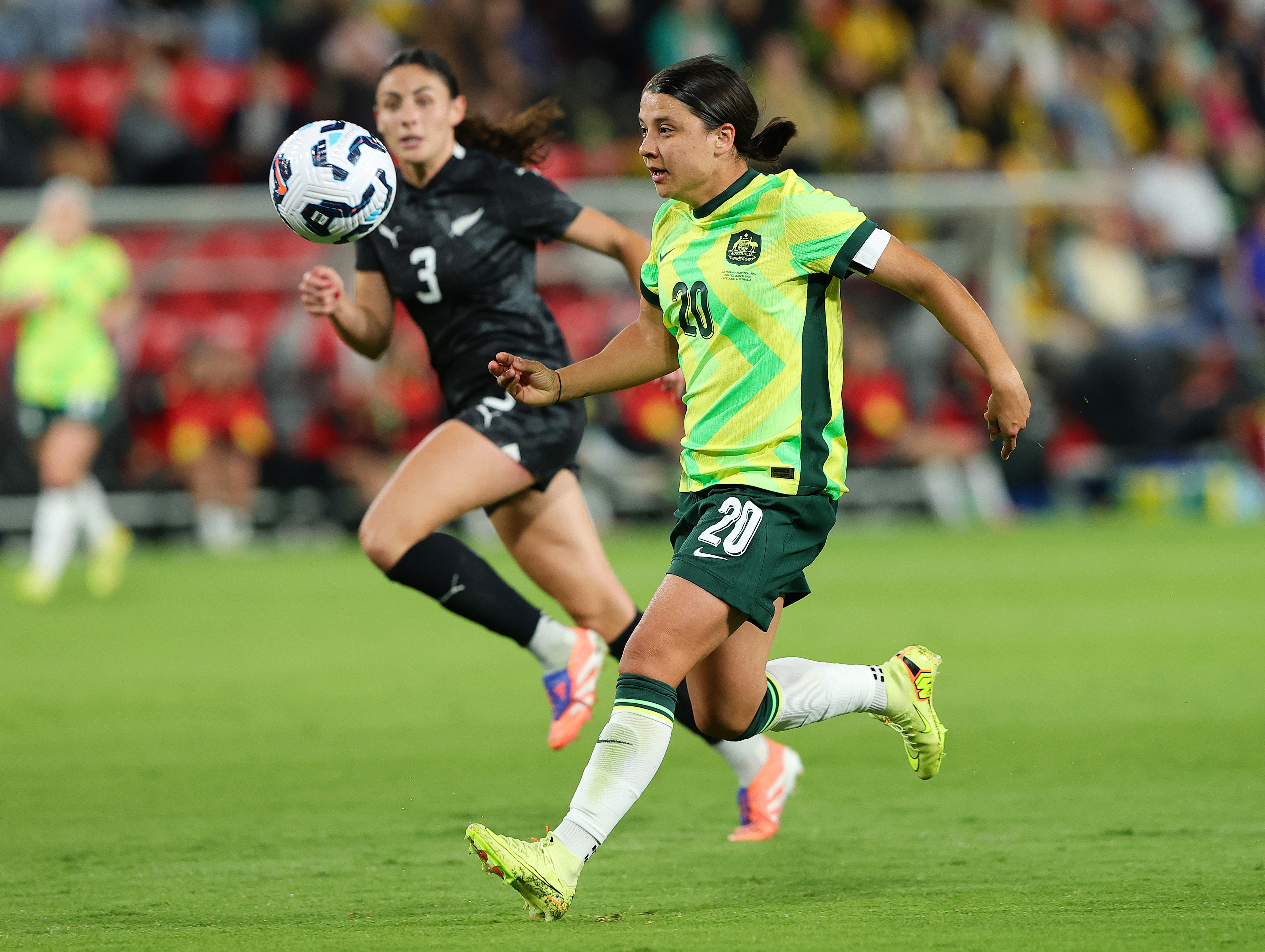 Matildas' Sam Kerr and NZ Ferns' Claudia Bunge face off during their international friendly.