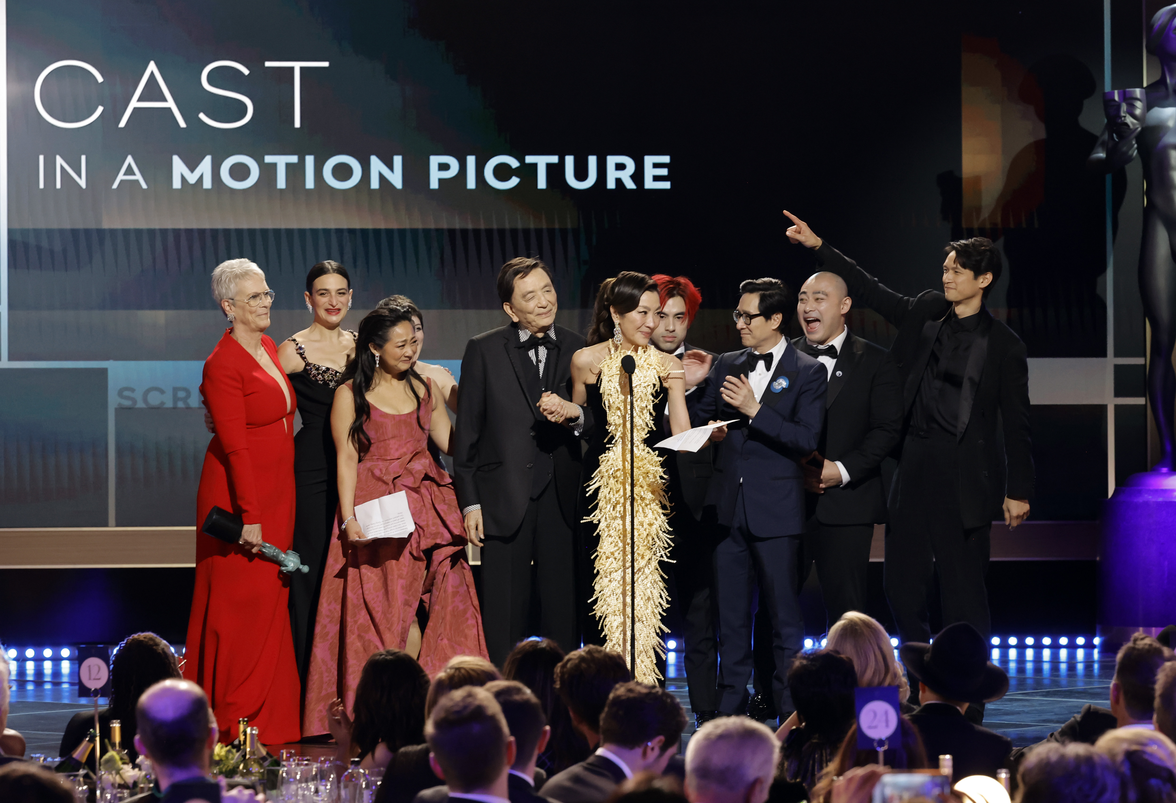 LOS ANGELES, CALIFORNIA - FEBRUARY 26: (L-R) Jamie Lee Curtis, Jenny Slate, Stephanie Hsu, James Hong, Michelle Yeoh, Andy Le, Ke Huy Quan, Brian Le, and Harry Shum Jr. accept the Outstanding Performance by a Cast in a Motion Picture award for "Everything Everywhere All at Once" onstage during the 29th Annual Screen Actors Guild Awards at Fairmont Century Plaza on February 26, 2023 in Los Angeles, California. (Photo by Kevin Winter/Getty Images)