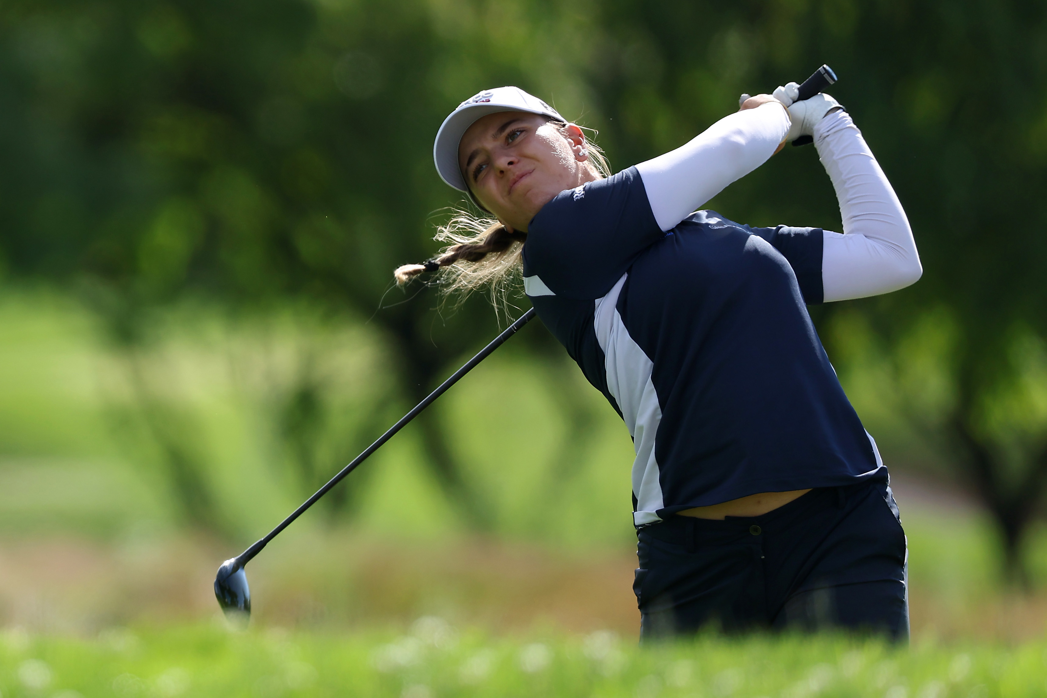 Stephanie Kyriacou of Australia plays her second shot on the 15th hole during the third round of the Amundi Evian Championship at Evian Resort Golf Club on July 13, 2024 in Evian-les-Bains, France. (Photo by Matthew Lewis/Getty Images)