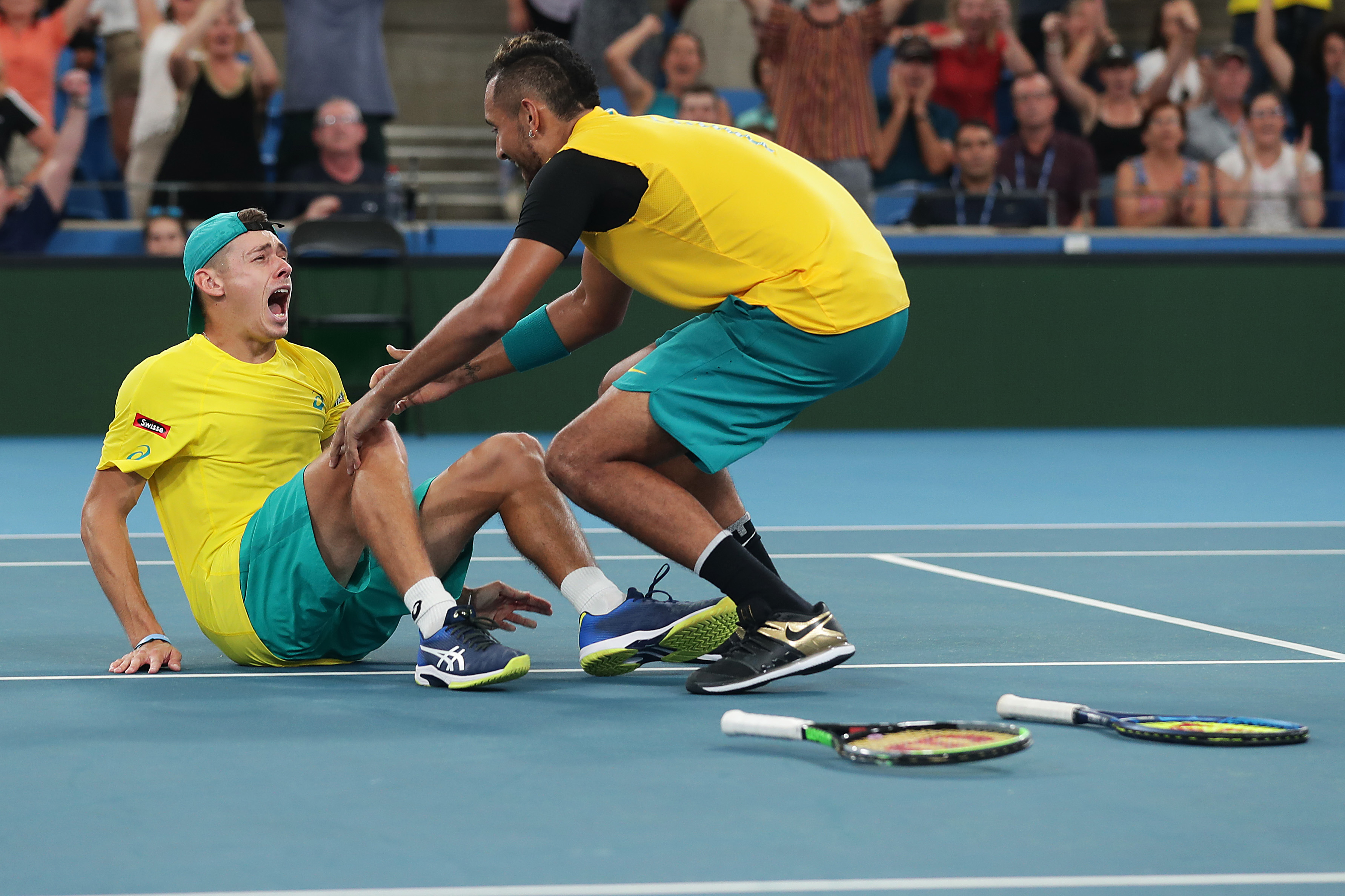 SYDNEY, AUSTRALIA - JANUARY 09: Alex de Minaur and Nick Kyrgios celebrate winning match point during their quarter final doubles match against Jamie Murray and Joe Salisbury of Great Britain during day seven of the 2020 ATP Cup at Ken Rosewall Arena on January 09, 2020 in Sydney, Australia. (Photo by Mark Metcalfe/Getty Images)