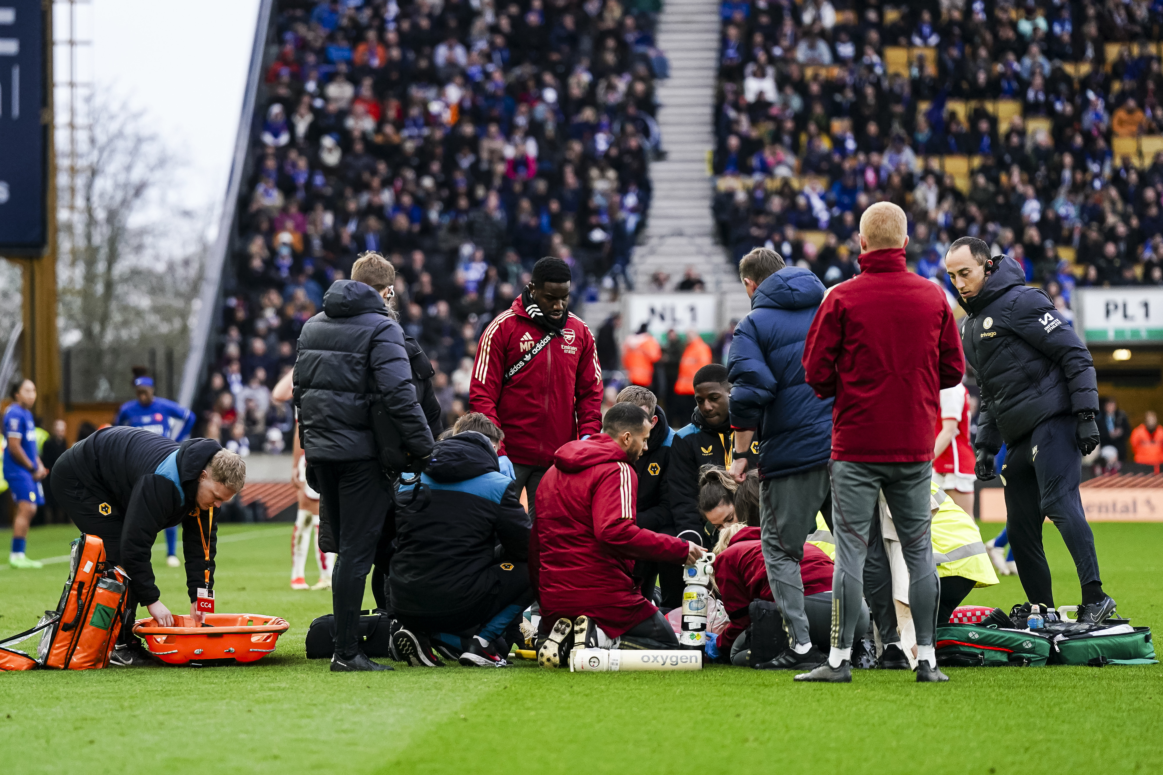 Frida Maanum of Arsenal lies injured while assisted by medics during the FA Women's League Cup final.