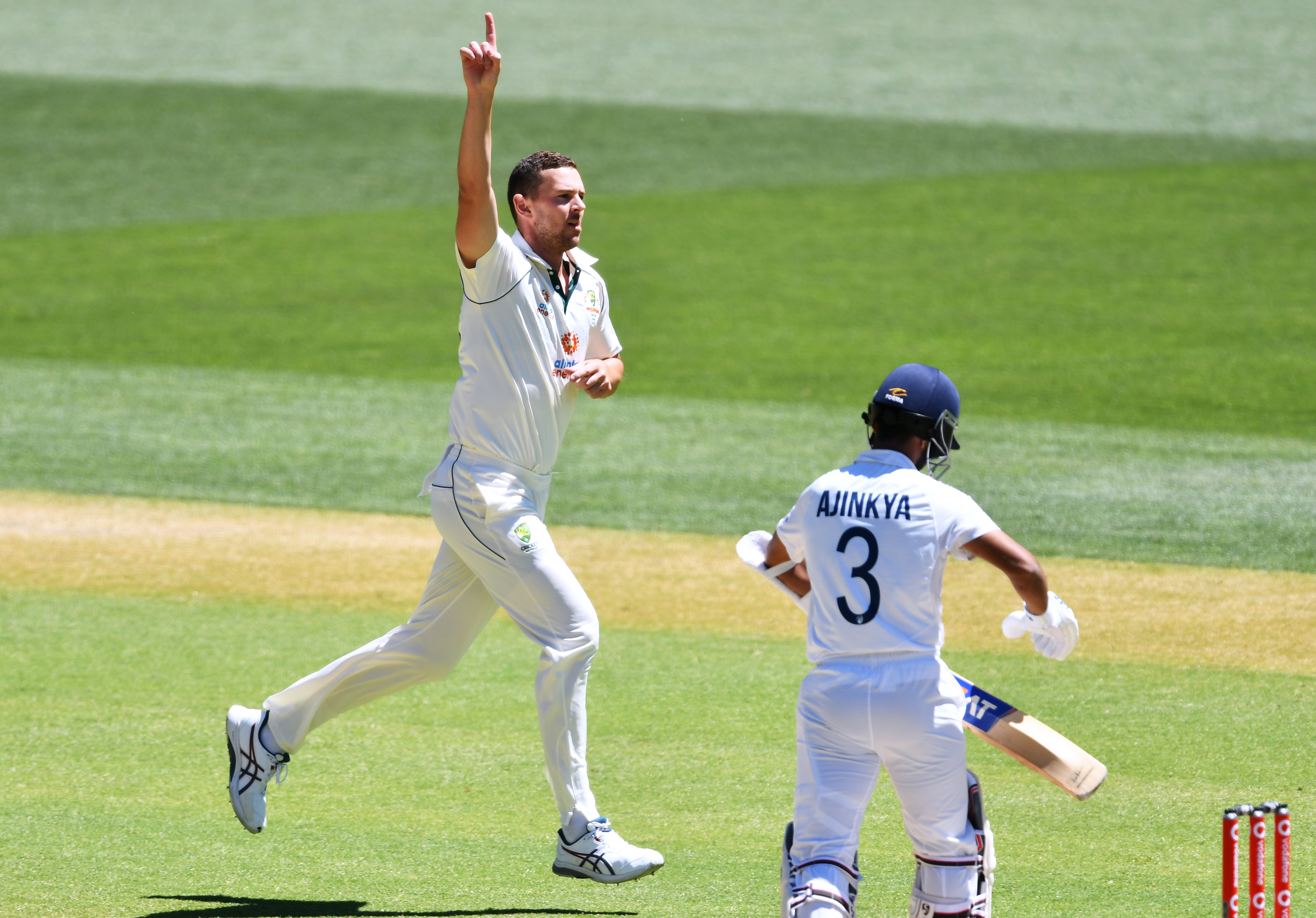 Josh Hazelwood of Australia celebrates the wicket of Ajinkya Rahane of India.