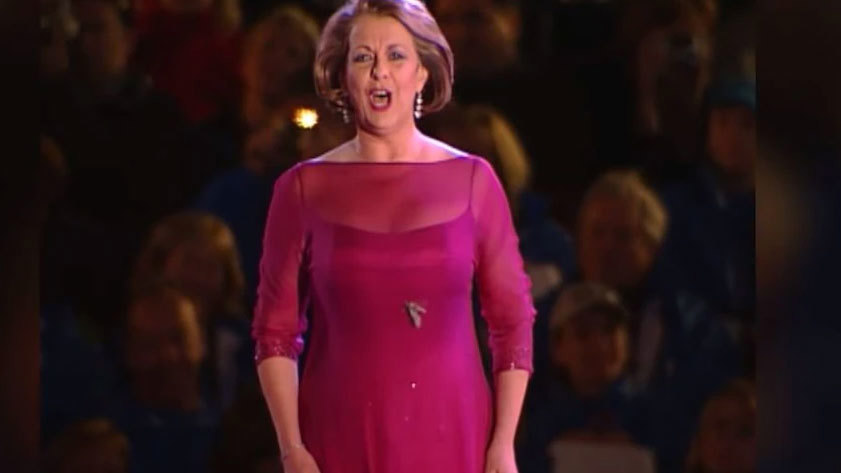 Yvonne Kenny performs at the closing ceremony of the Sydney Olympics, with a bogong moth on her torso.