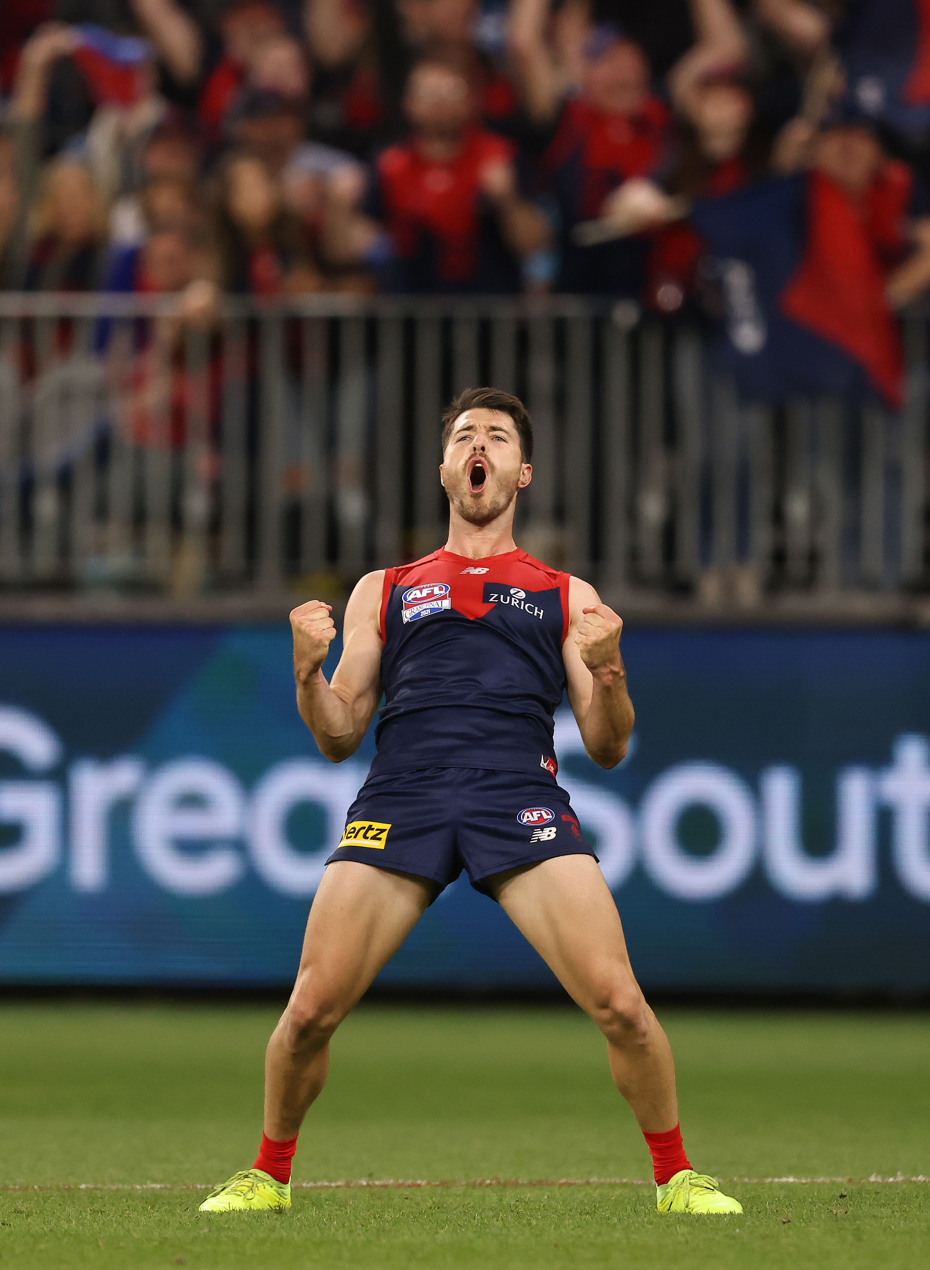 Alex Neal-Bullen of the Demons celebrates after scoring a goal