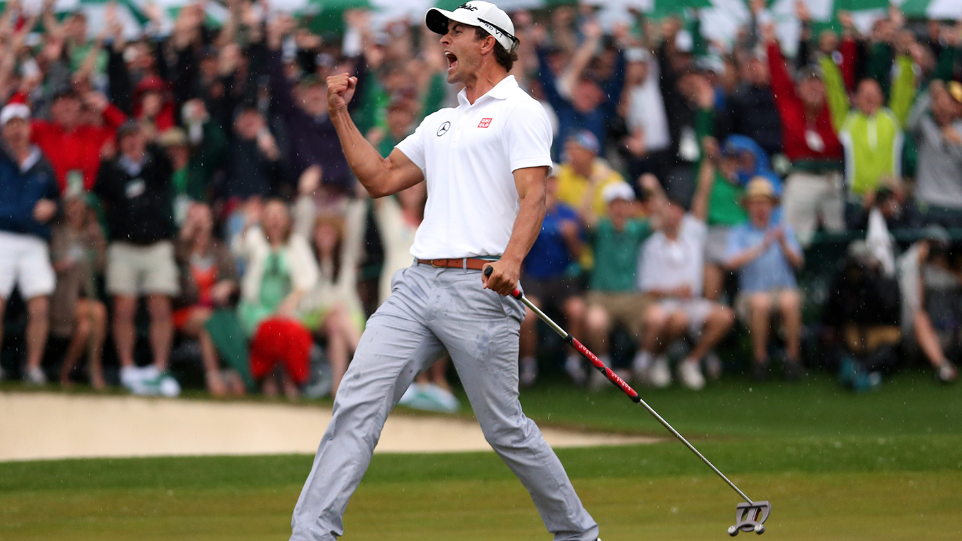 Adam Scott celebrates his birdie at the 18th hole during the final round of the 2013 Masters.