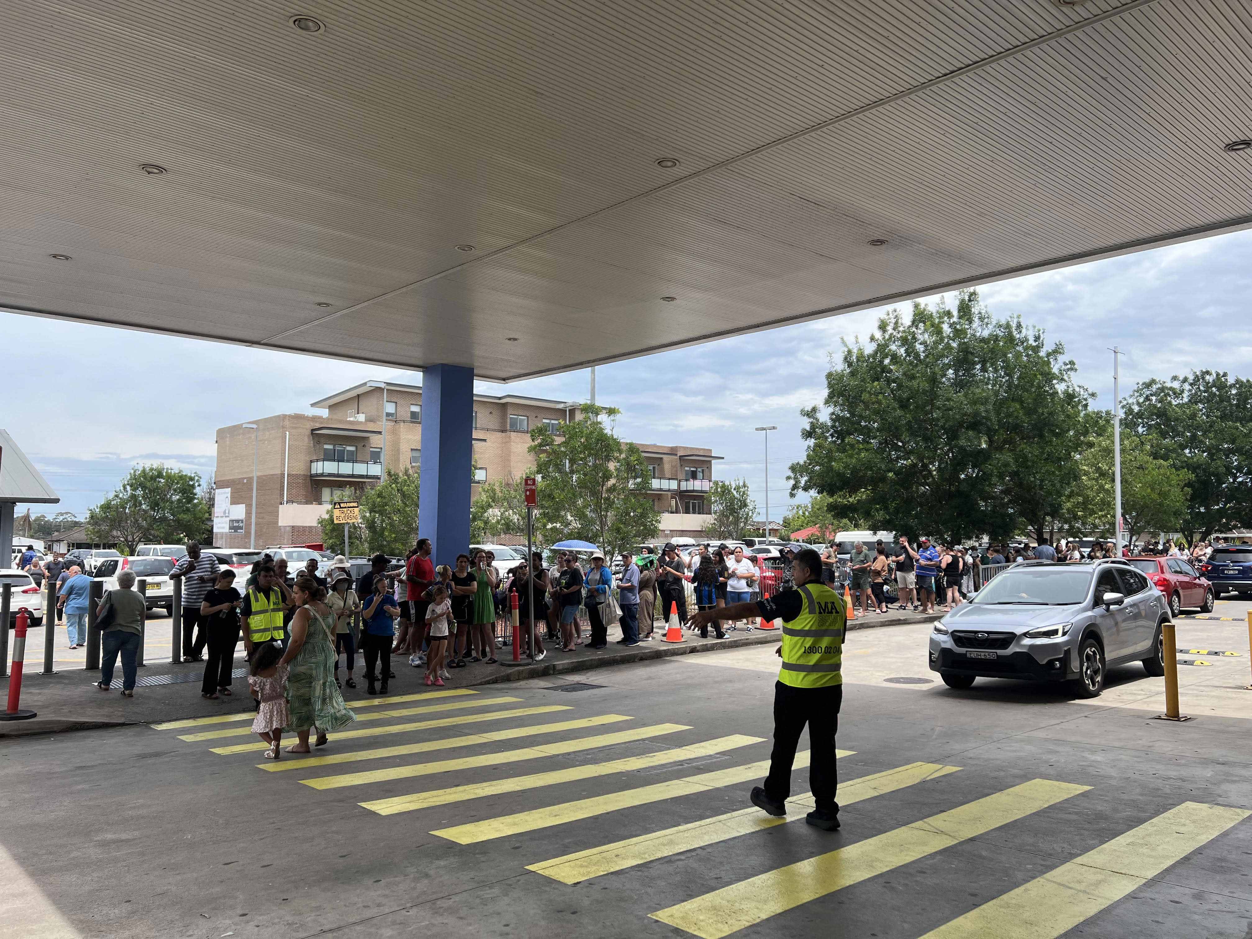 Australians have been lining up all morning to get a slice of billionaire Adrian Portelli's $150,000 giveaway, with the lucky ones planning to use the money to alleviate cost of living pressures.