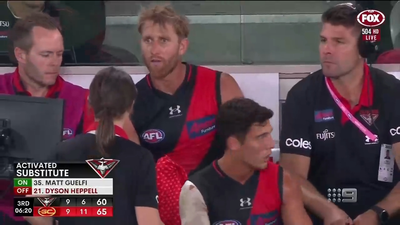 Dyson Heppell appears shocked as he is told he has been subbed out of the match.