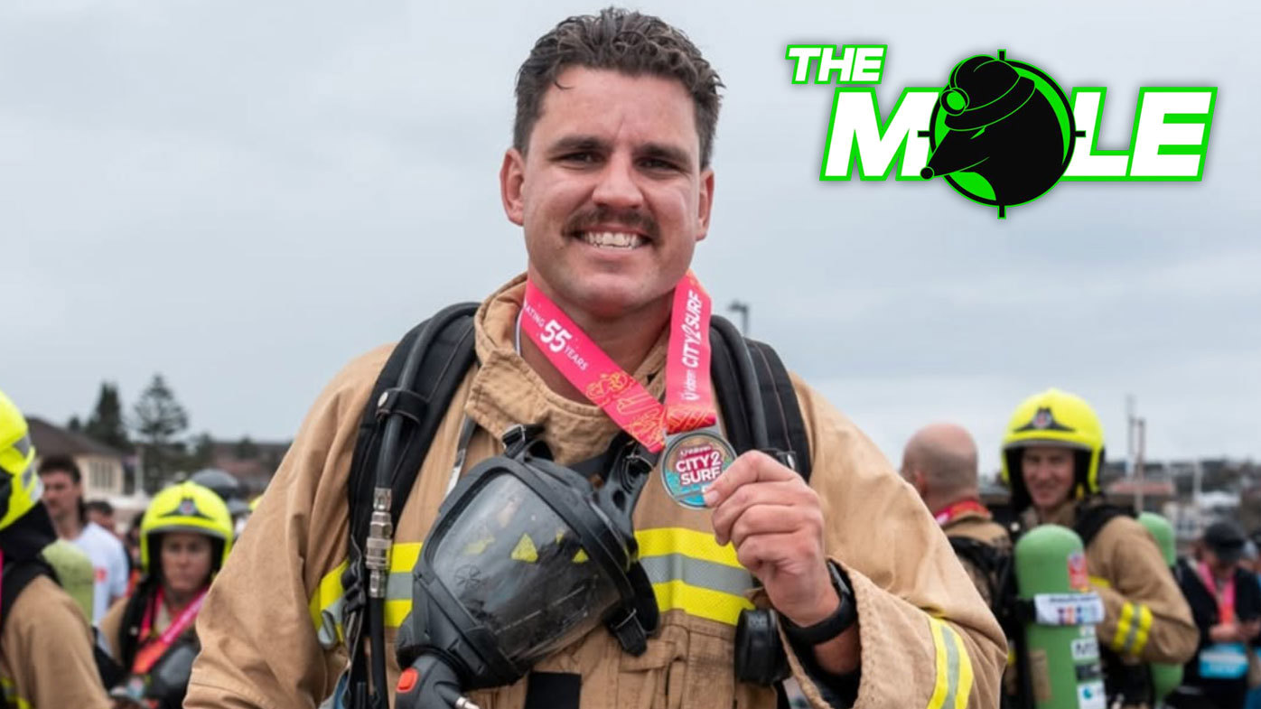 Knights fan Dan Nilsson, who ran the City2Surf in his fire service uniform.