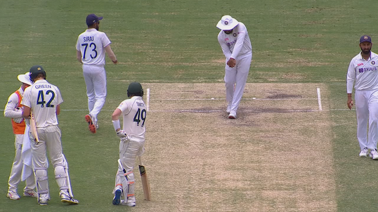 Rohit Sharma shadow bats as Steve Smith watches on.