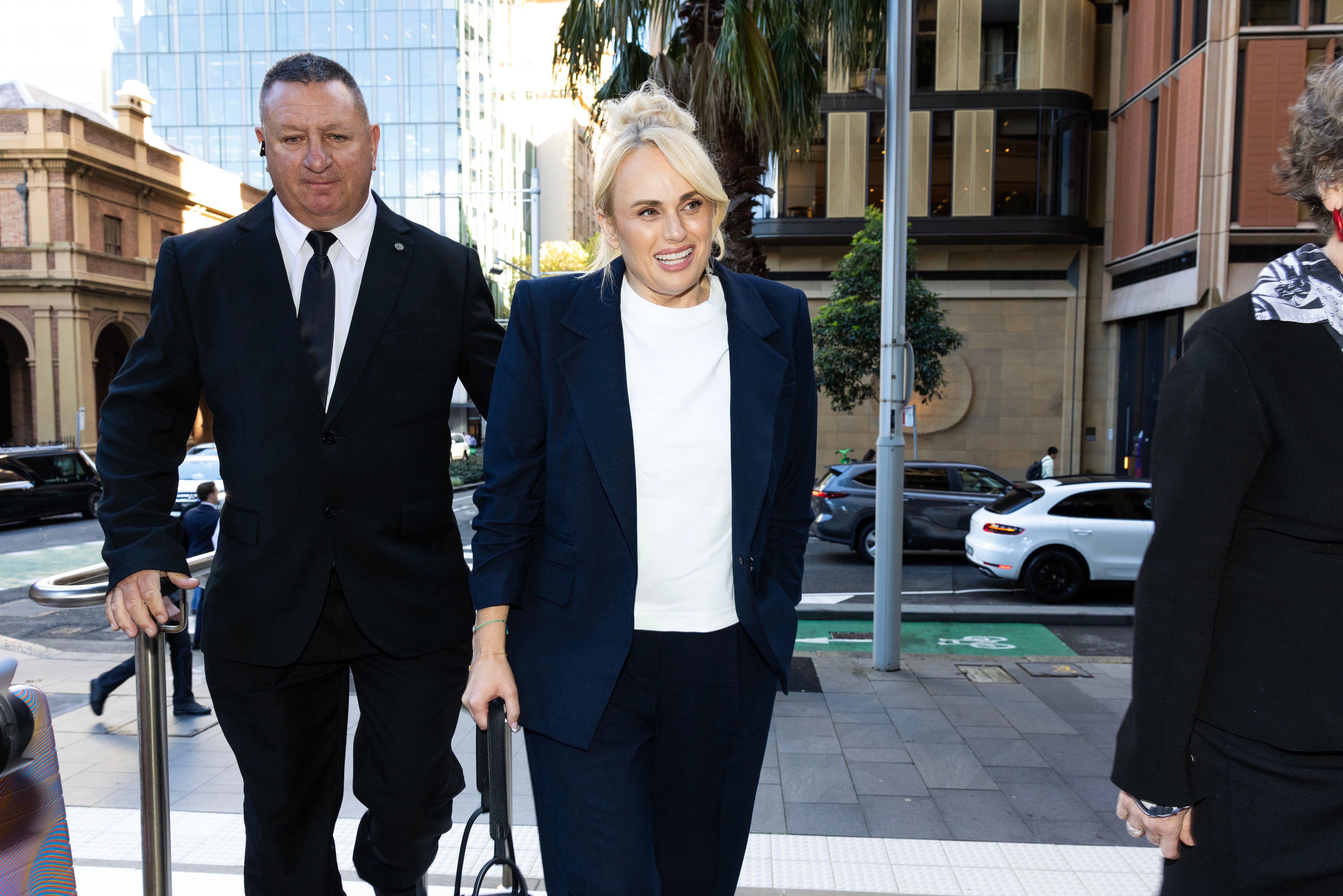 Rebel Wilson arrives to give testimony for a third day in a row during her defamation trial.