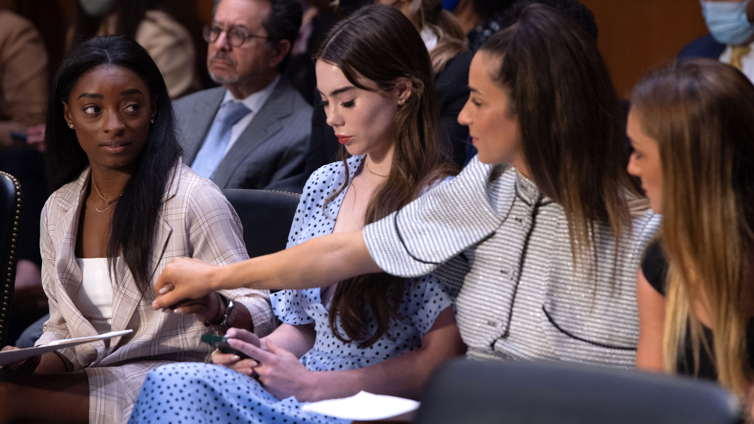 US Olympic gymnasts (L-R) Simone Biles, McKayla Maroney,  Aly Raisman and Maggie Nichols, arrive to testify during a Senate Judiciary hearing about the Inspector General's report on the FBI handling of the Larry Nassar investigation of sexual abuse of Olympic gymnasts, on Capitol Hill, September 15, 2021, in Washington, DC.