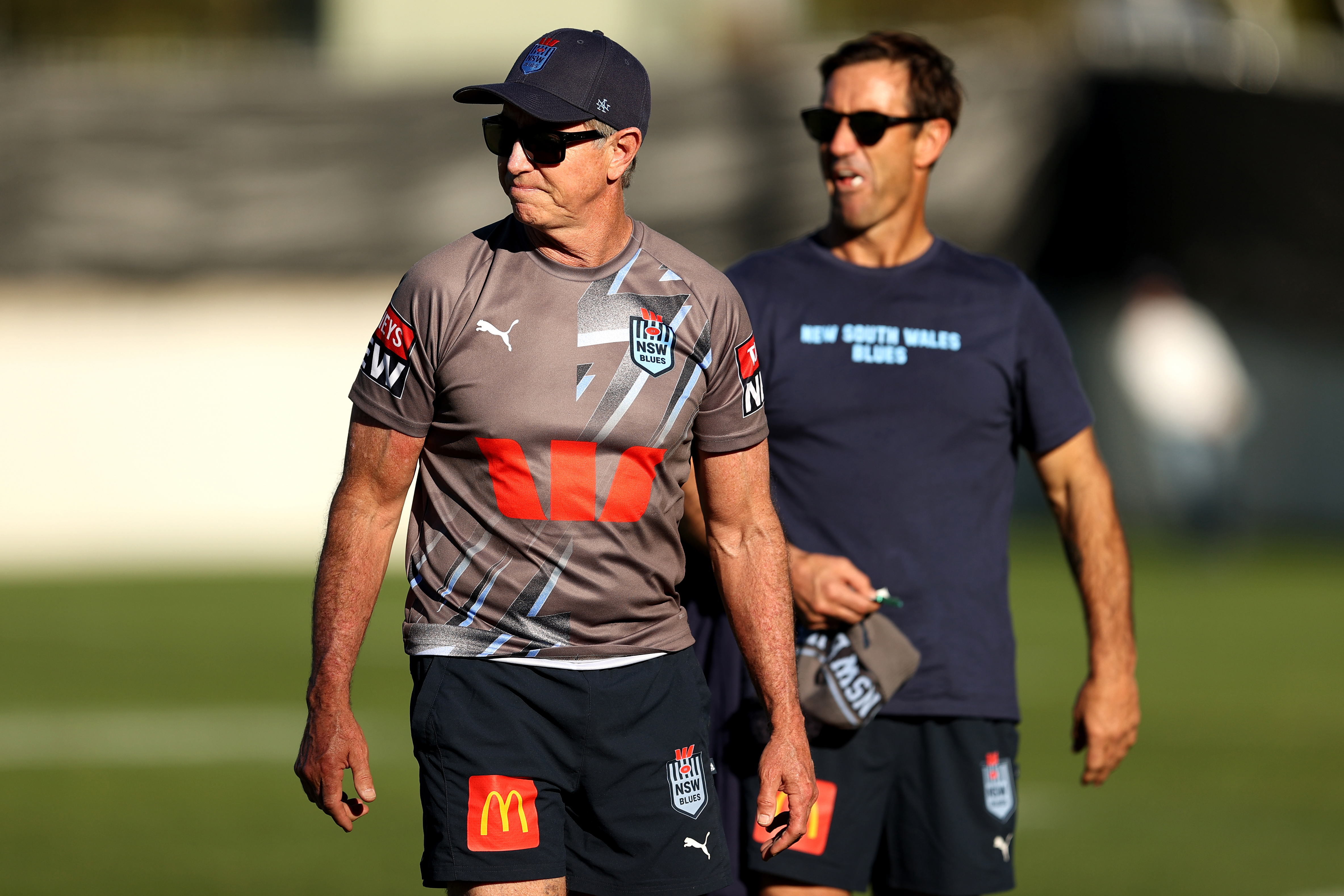 Blues advisor Greg Alexander and Andrew Johns speak during the New South Wales State of Origin training.