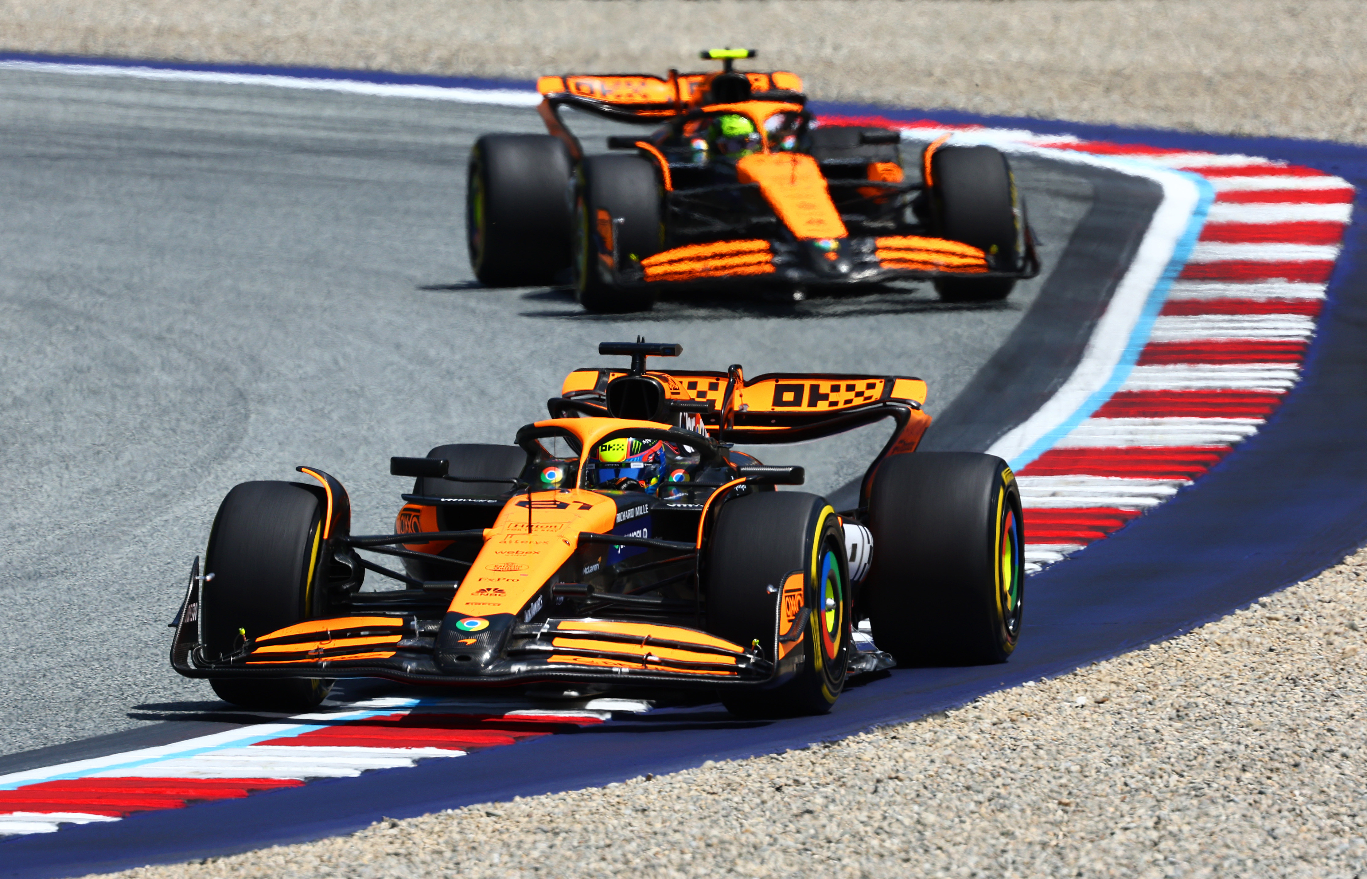 Oscar Piastri of Australia driving the (81) McLaren MCL38 Mercedes leads Lando Norris of Great Britain driving the (4) McLaren MCL38 Mercedes during the Sprint ahead of the F1 Grand Prix of Austria at Red Bull Ring on June 29, 2024 in Spielberg, Austria. (Photo by Clive Rose/Getty Images)