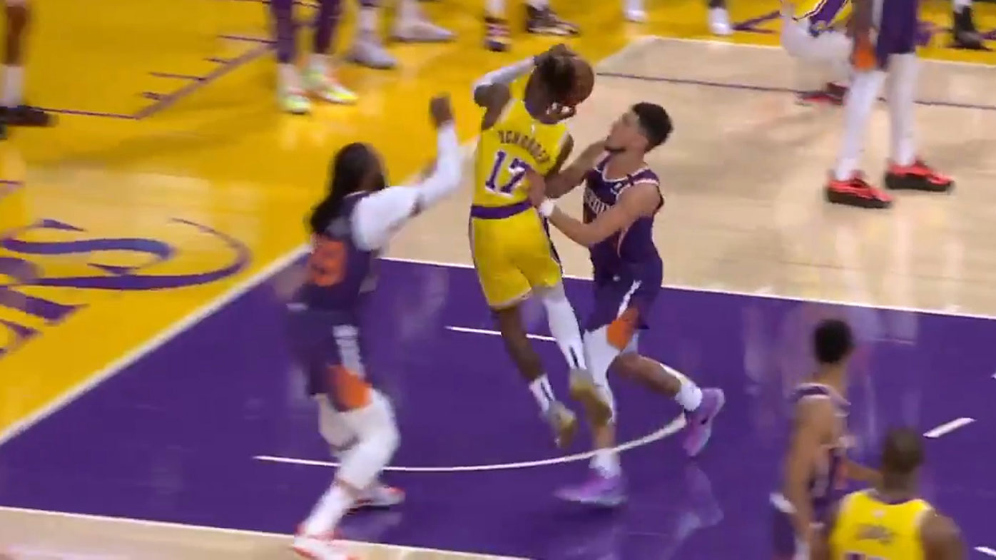 Devin Booker pushes Dennis Schroder