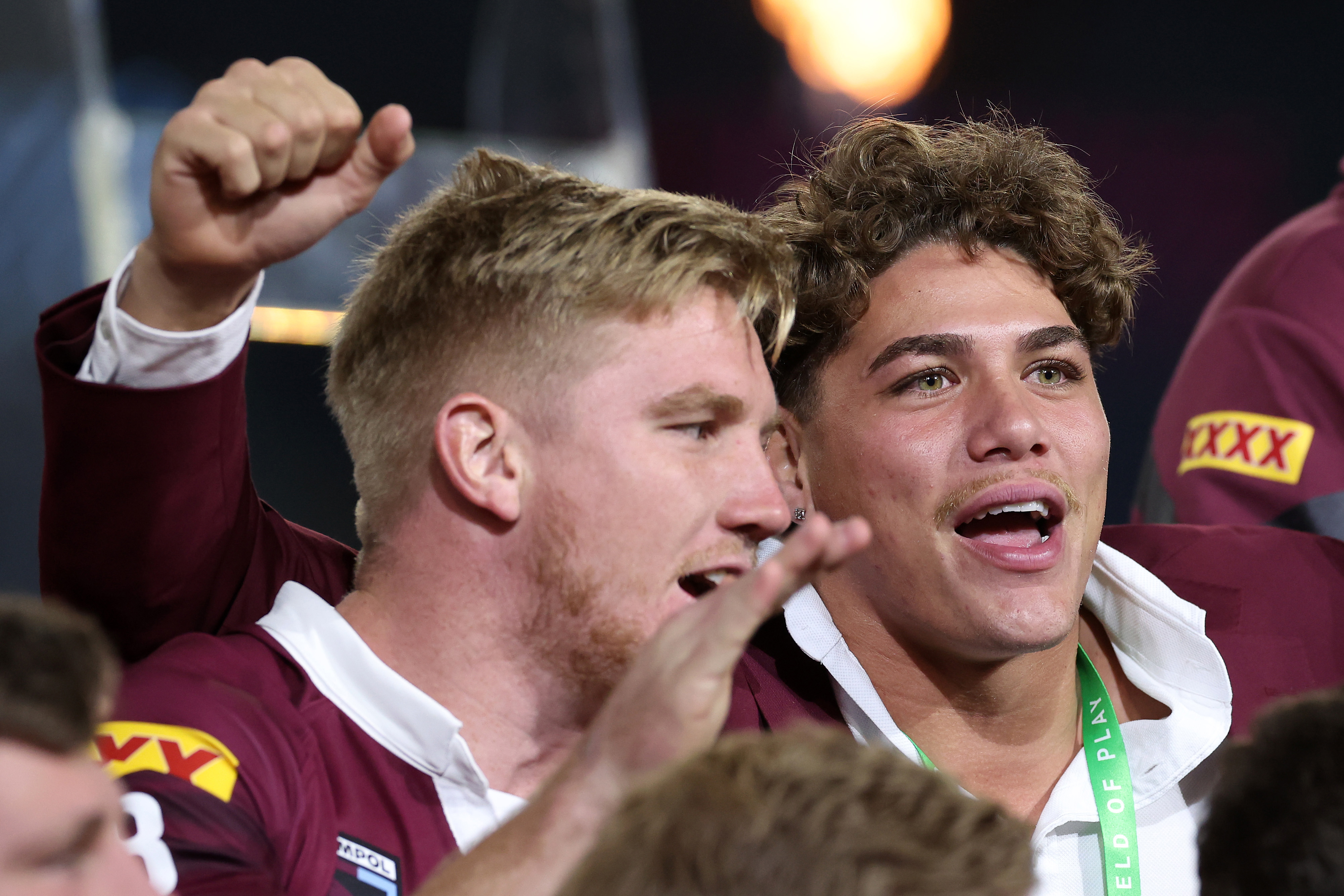 Reece Walsh of the Maroons celebrates with team mates after winning the series 2-1 after game three of the State of Origin series.