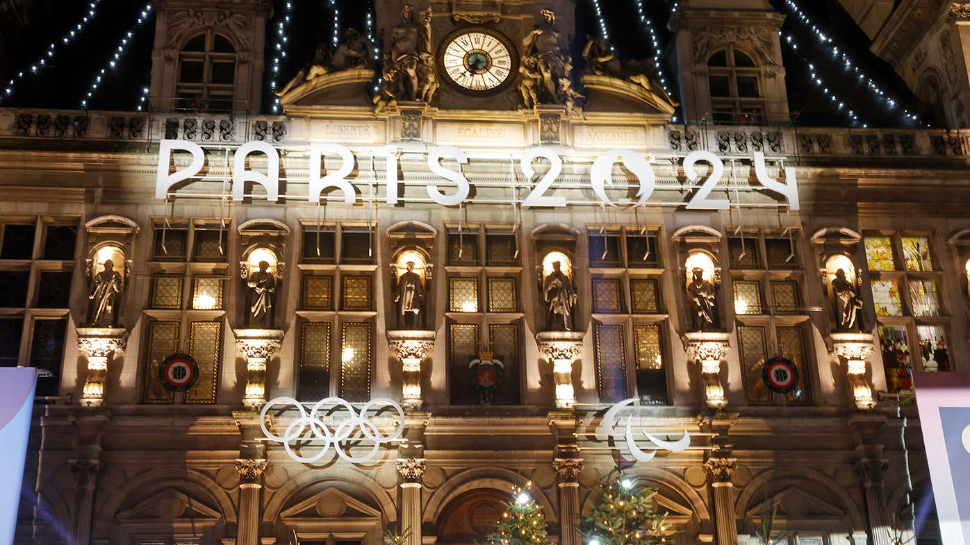 The Paris 2024 logo is illuminated on the facade of the Paris town hall ahead of the  Paris 2024 Olympic and Paralympic Games.