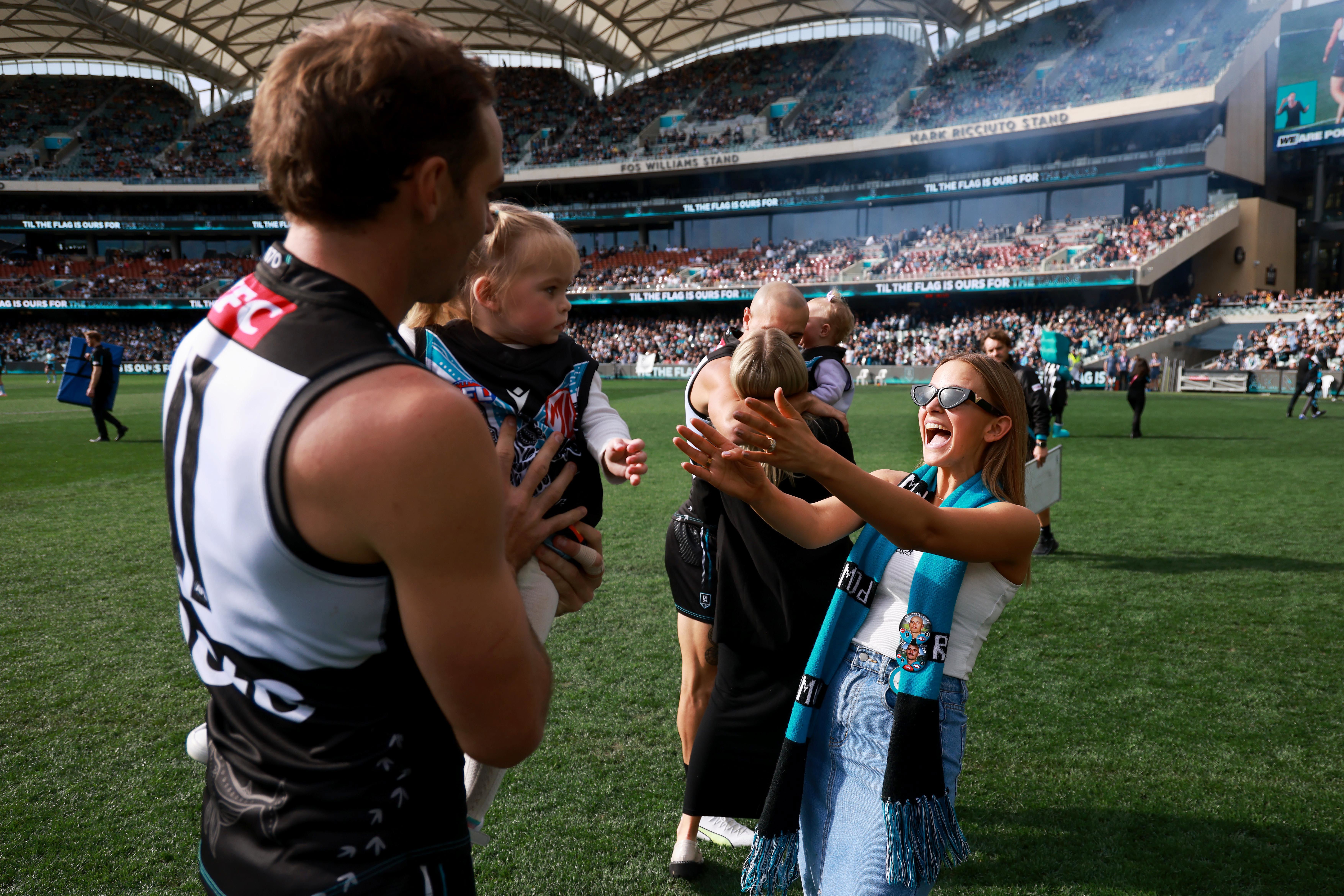 Finlayson with wife Kellie and daughter Sophia.