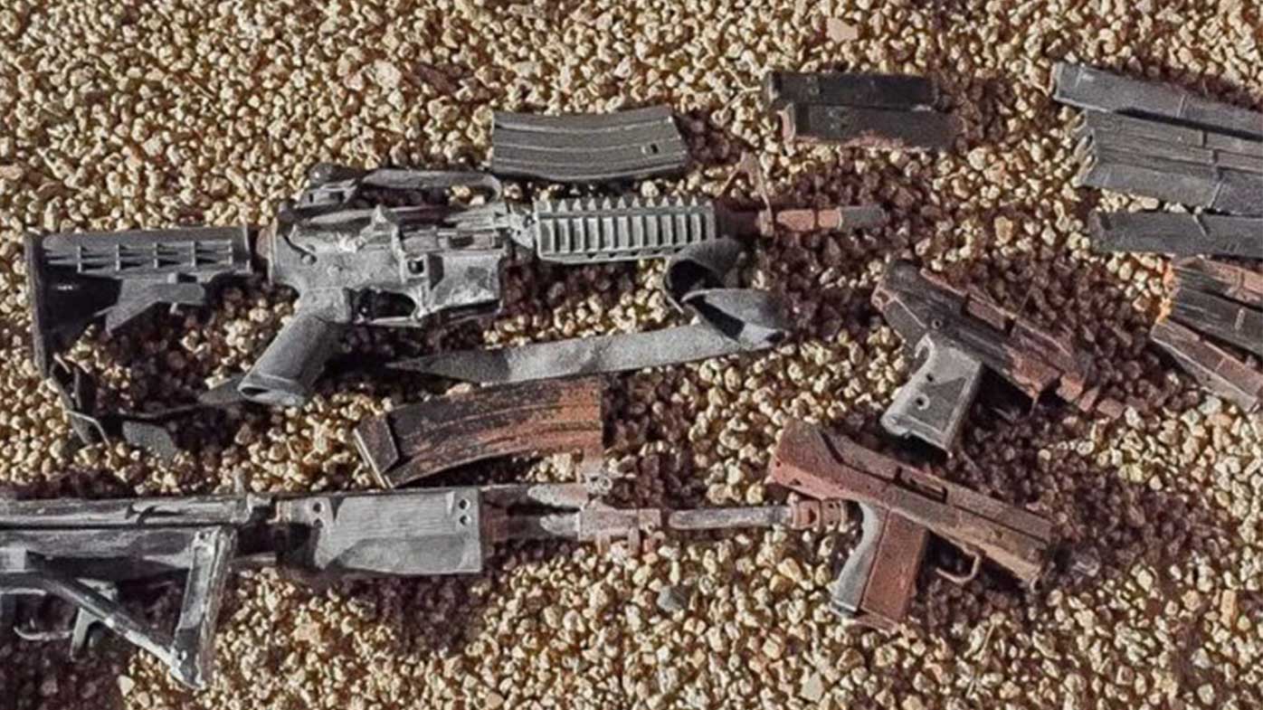 Phoenix Police are now trying to find out who buried this bag of guns in a backyard.