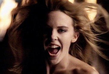 Kylie Minogue in 'Better the Devil You Know' music video (Mushroom)