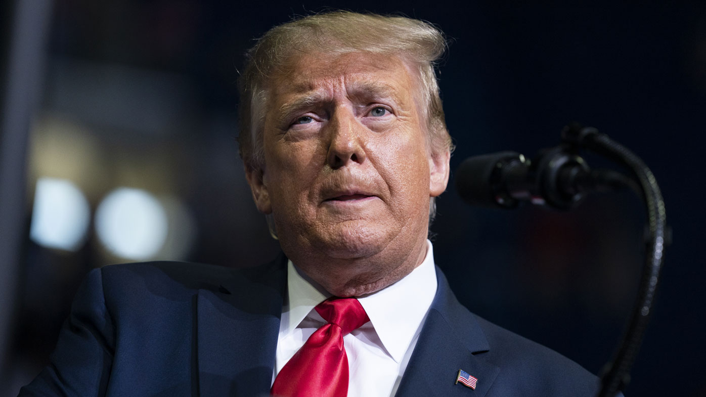 President Donald Trump speaks during a campaign rally, where the turnout was smaller than expected.