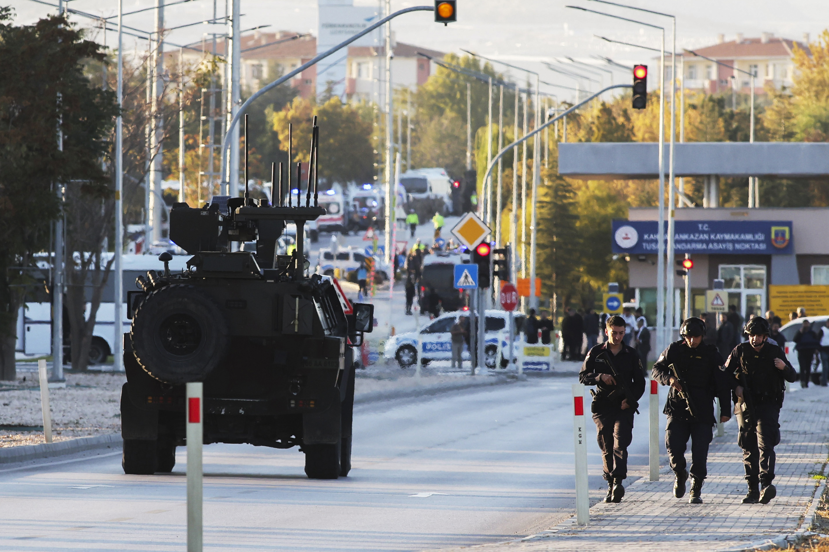 Emergency and security teams are deployed outside the Turkish state-run aerospace and defense company Turkish Aerospace Industries Inc. on the outskirts of Ankara, Turkey, Wednesday, Oct. 23, 2024. 