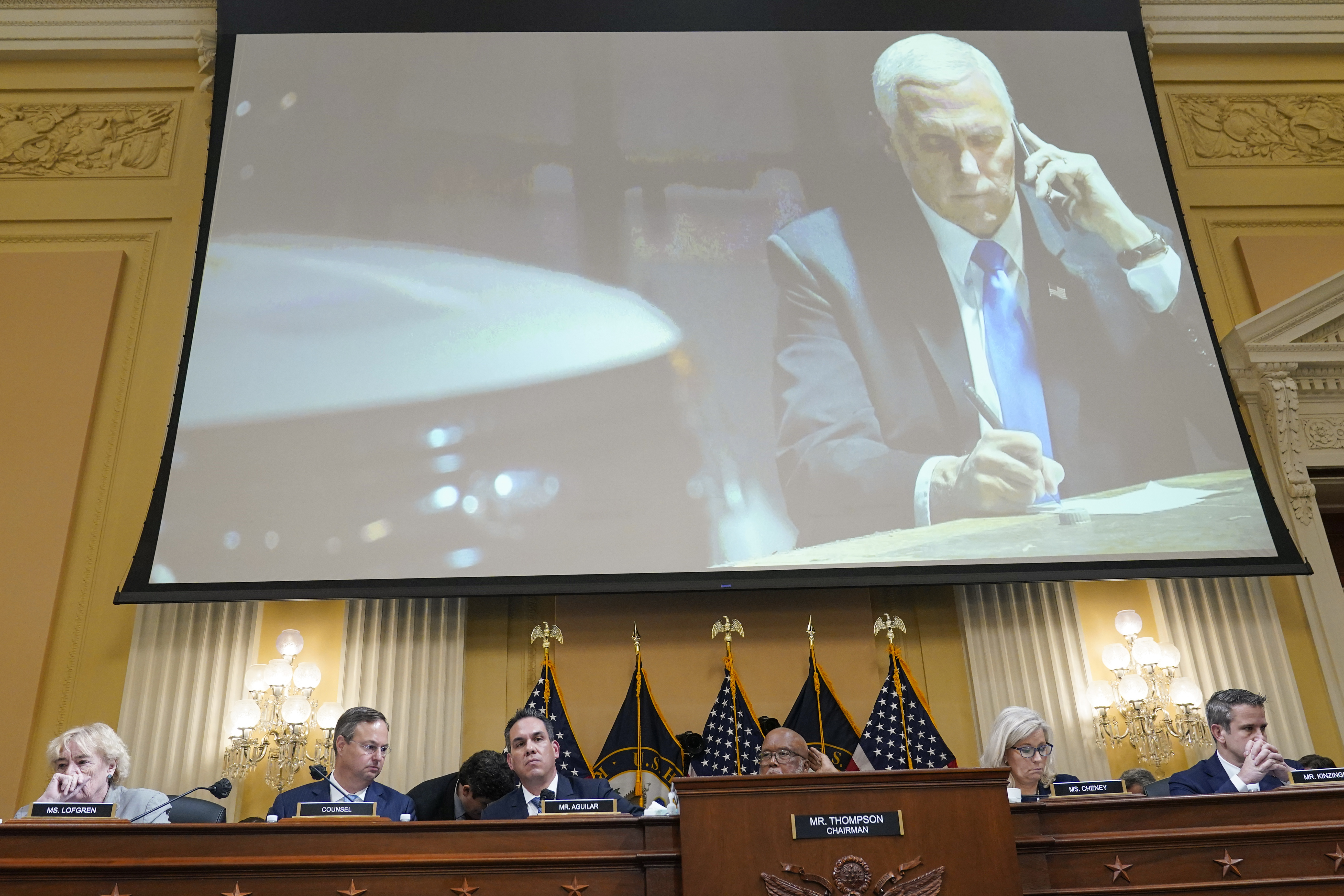 A committee exhibit shows former Vice President Mike Pence talking on the phone from his secure location during the riot, as the House select committee investigating the Jan. 6, 2021, attack on the Capitol holds a hearing at the Capitol in Washington, Thursday, June 16, 2022. (AP Photo/Susan Walsh)