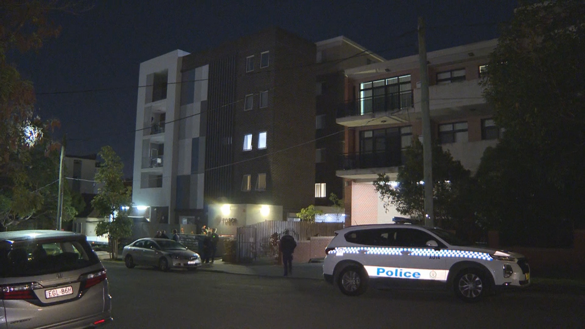 A man has been attacked with a samurai sword at a unit block in Lidcombe.