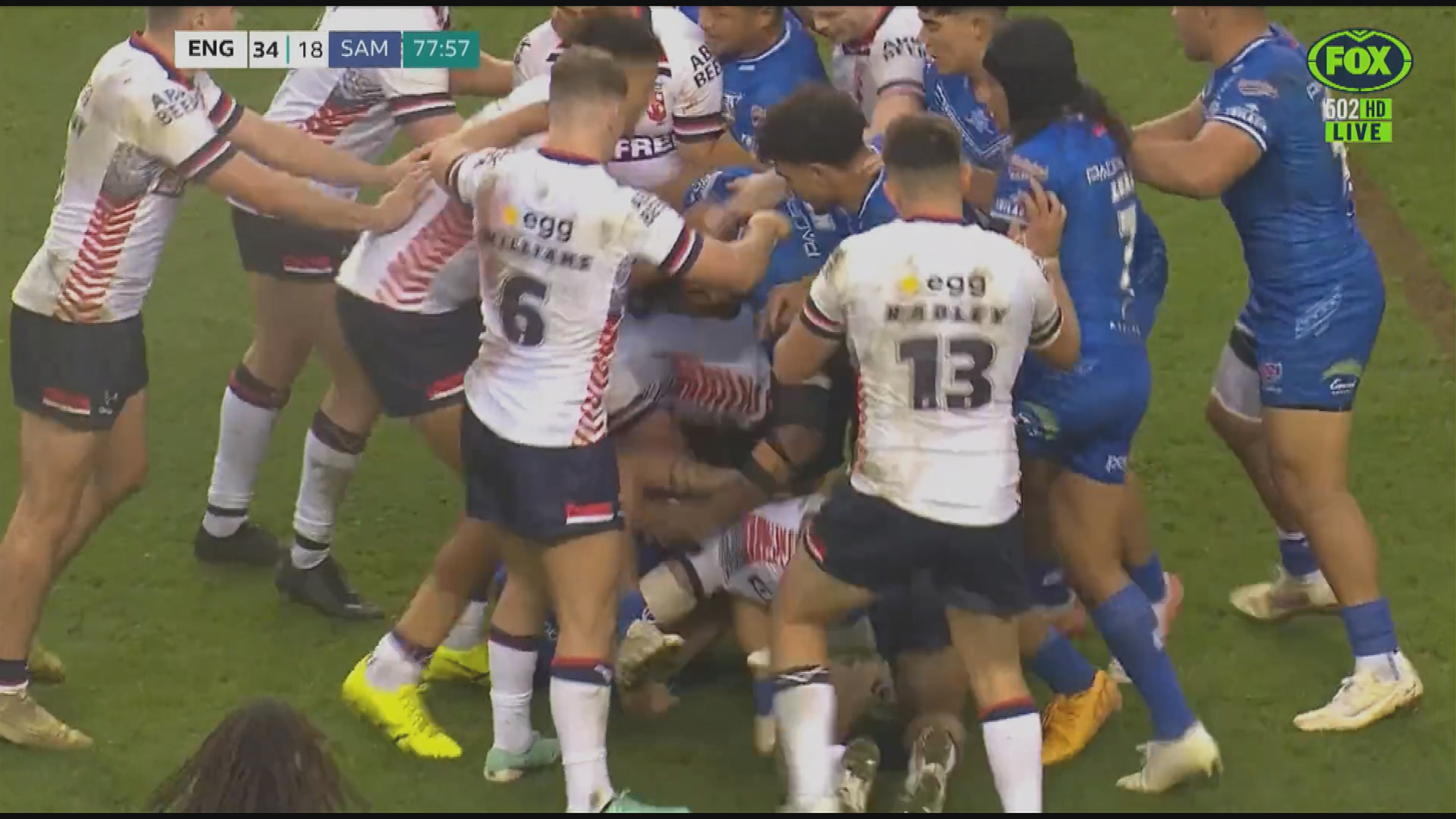 A wild all-in brawl marred the end of England's first Test victory over Samoa in Wigan.