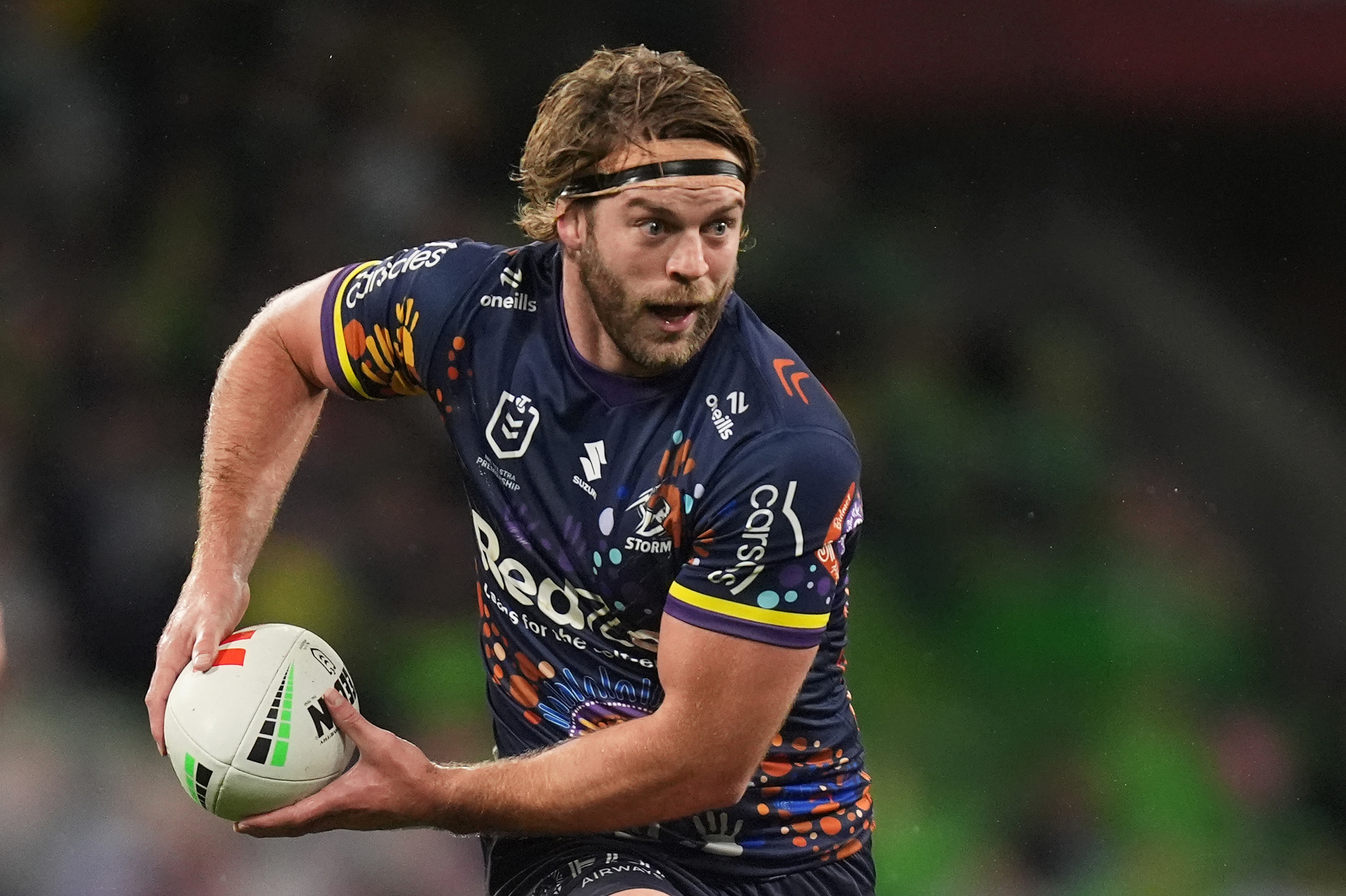 Christian Welch of the Storm looks to pass the ball during the round 17 NRL match between Melbourne Storm and Canberra Raiders at AAMI Park, on June 29, 2024, in Melbourne, Australia. (Photo by Daniel Pockett/Getty Images)