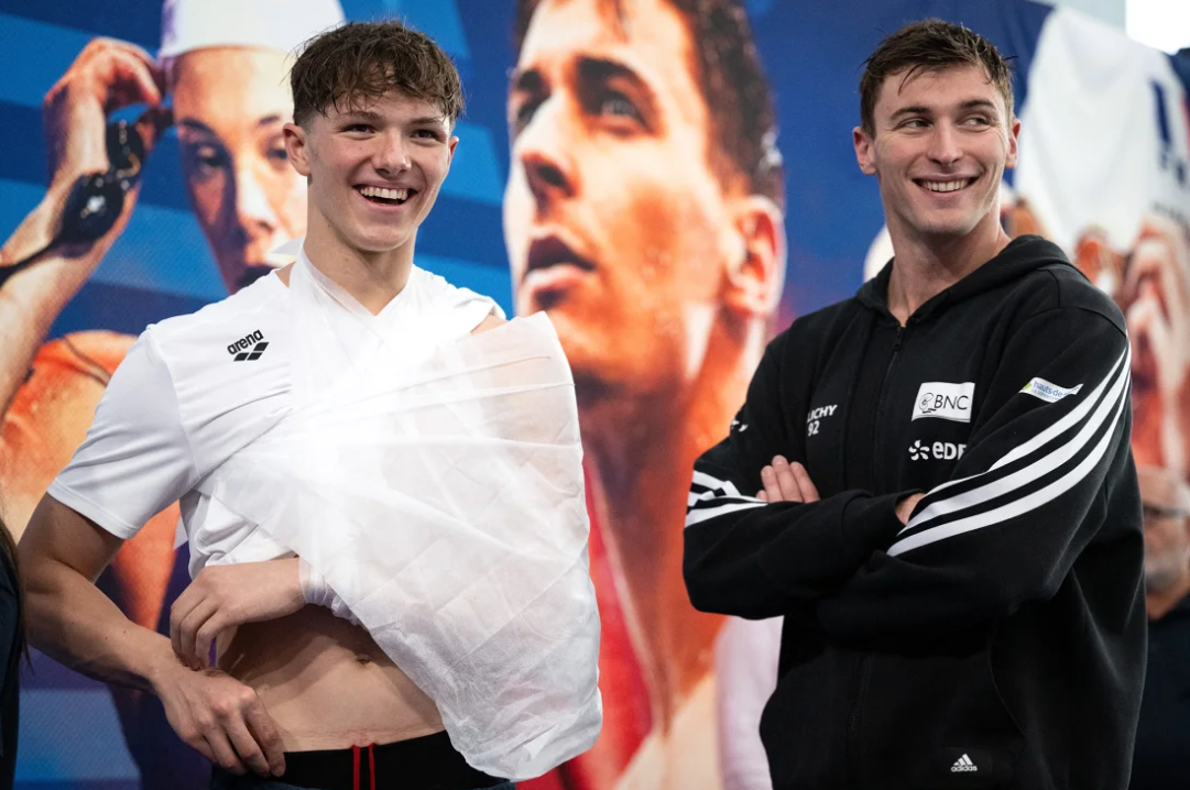 Rafael Fente-Damers (left) and Maxime Grousset (right) wait for their medals.